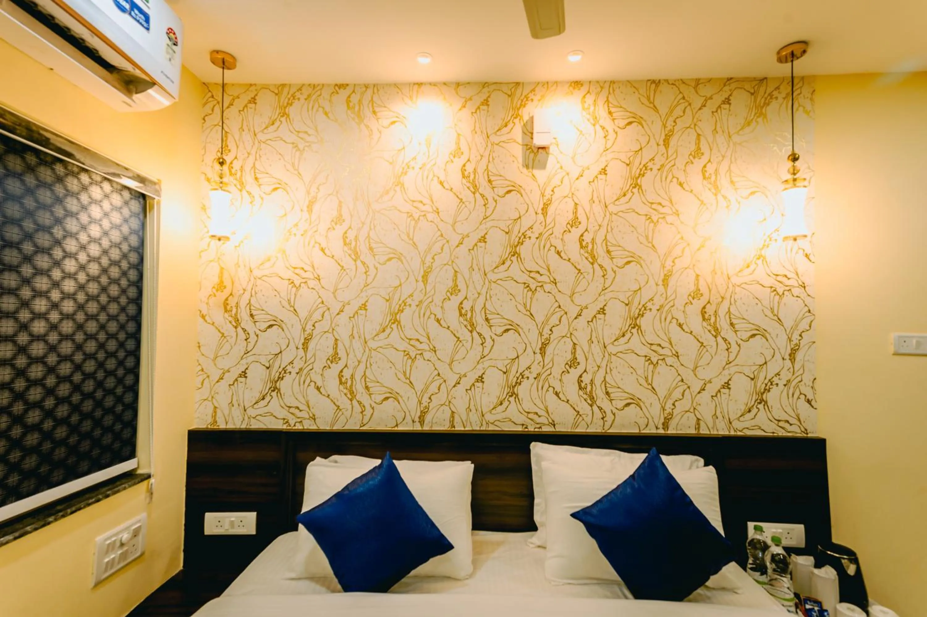 Bed in Livotel Premium Hotel