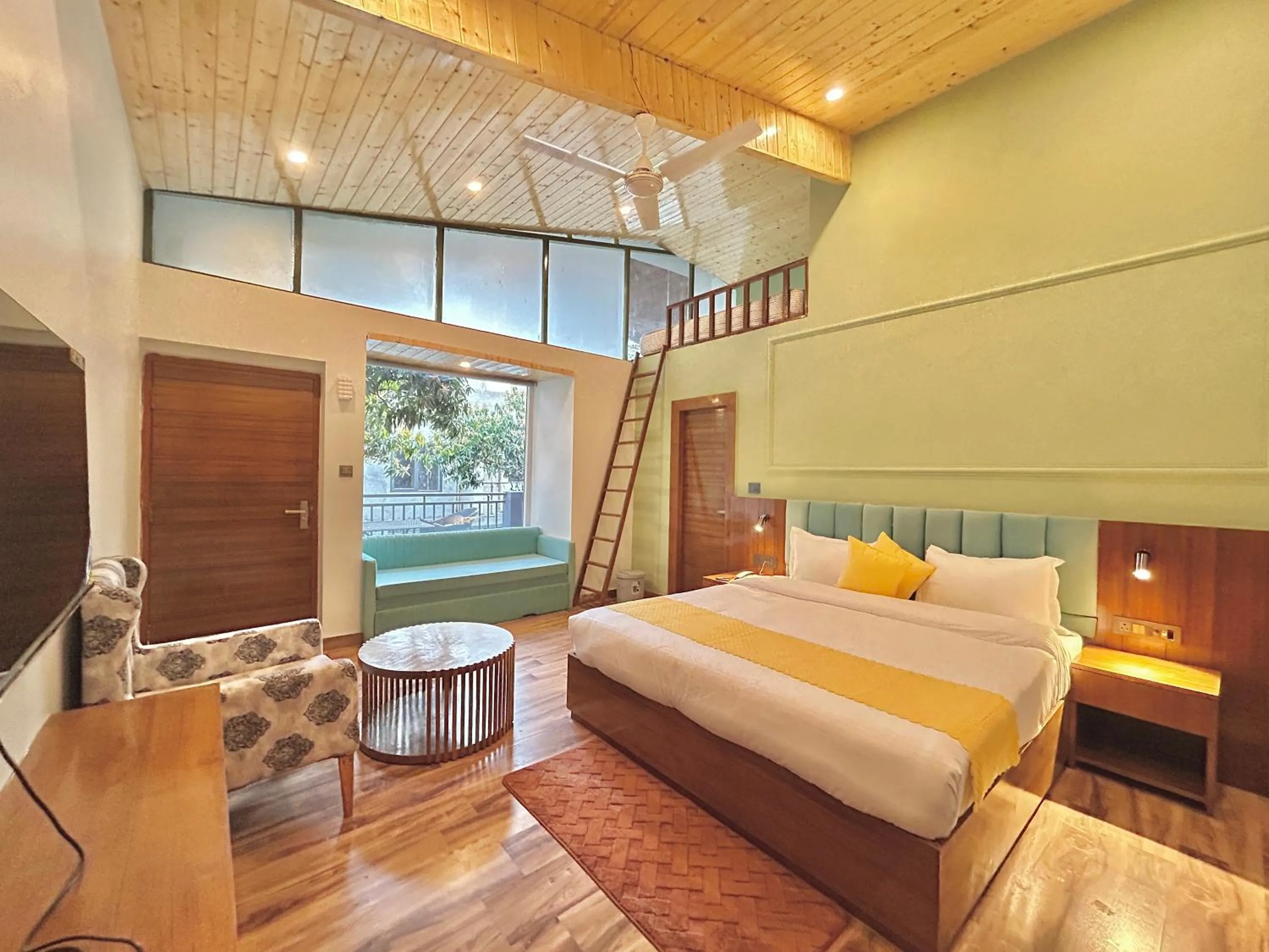 Photo of the whole room, Bed in Ravihans Aranyam - Resort & Restaurant