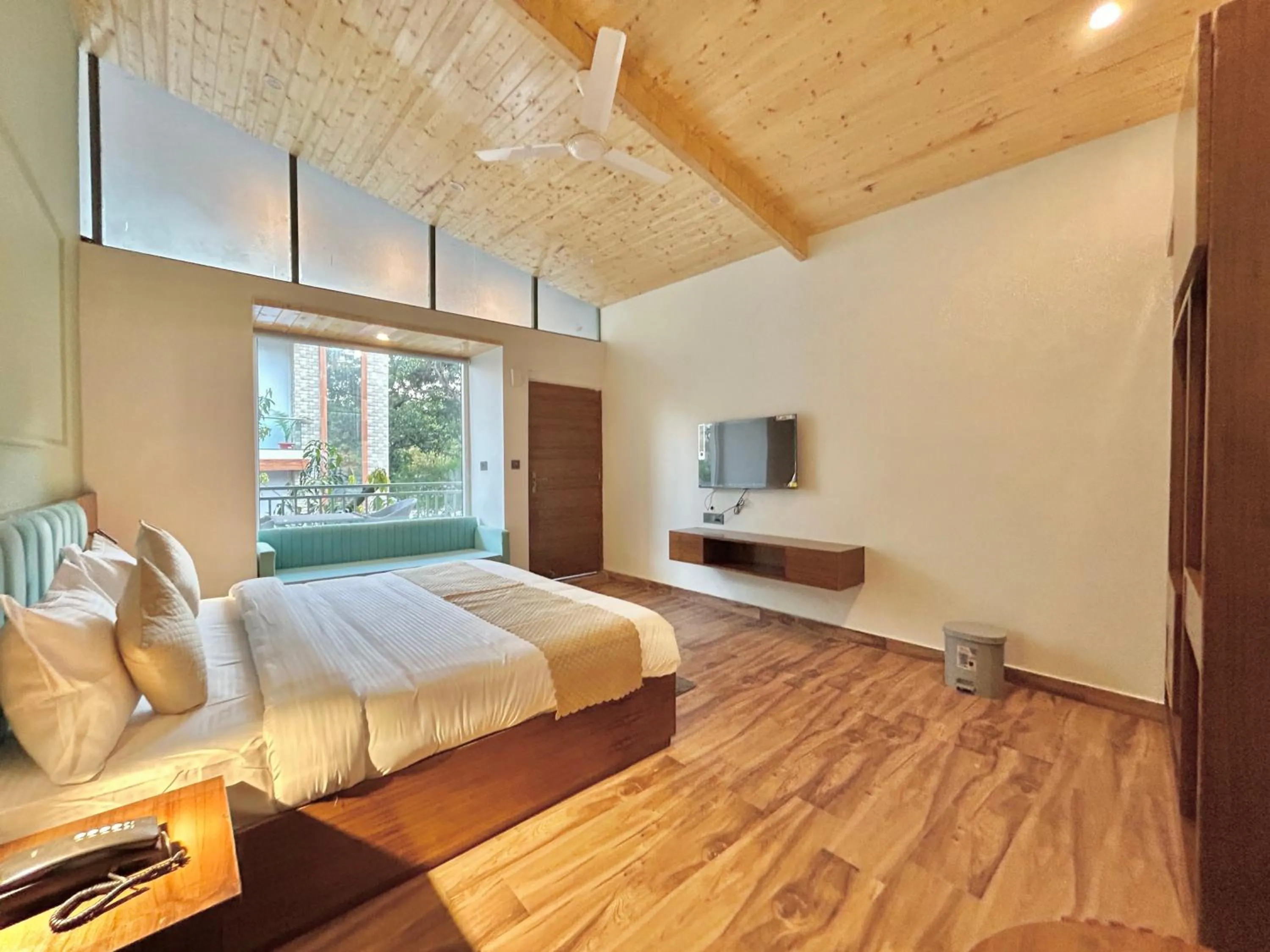 Photo of the whole room, Bed in Ravihans Aranyam - Resort & Restaurant