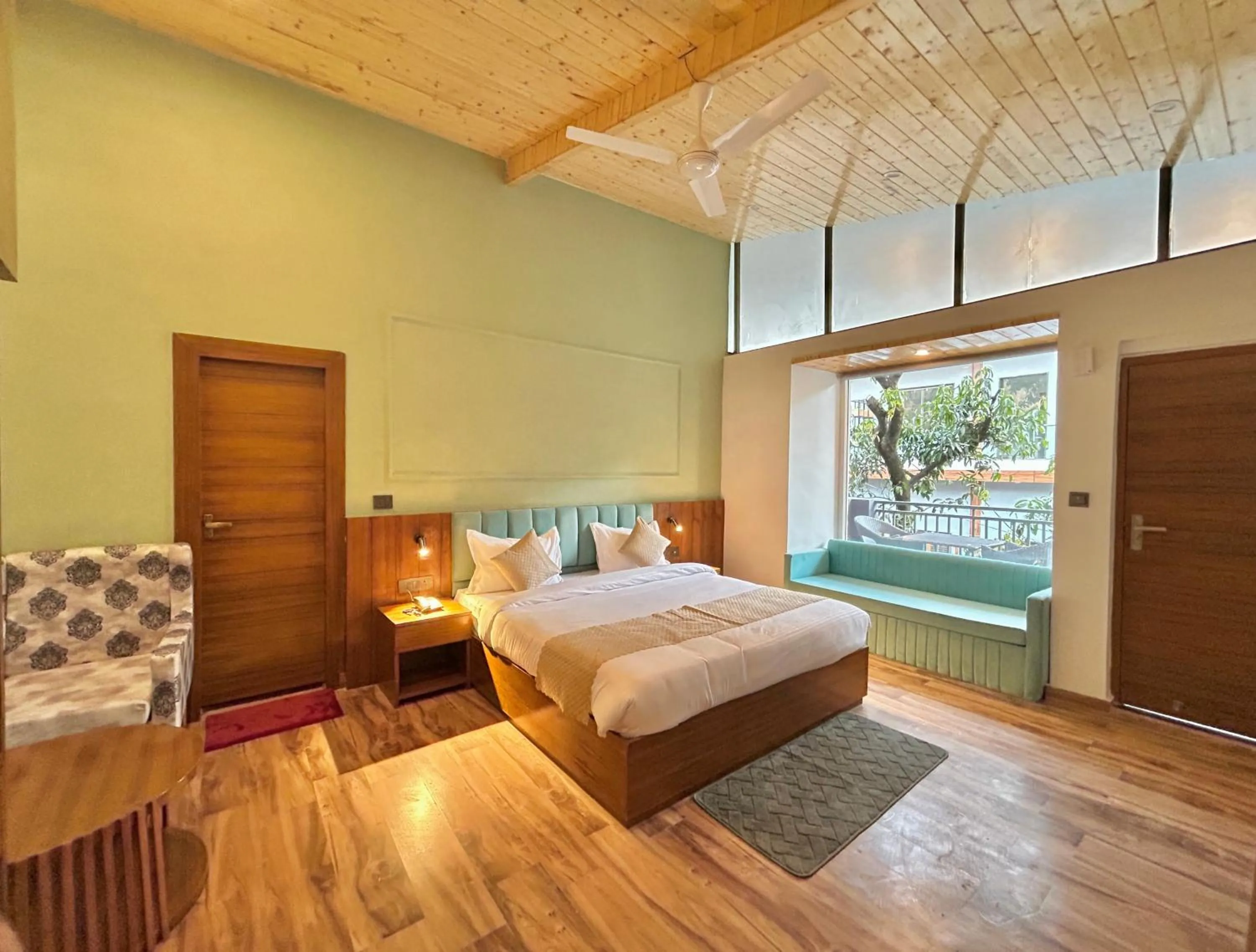 Bed in Ravihans Aranyam - Resort & Restaurant