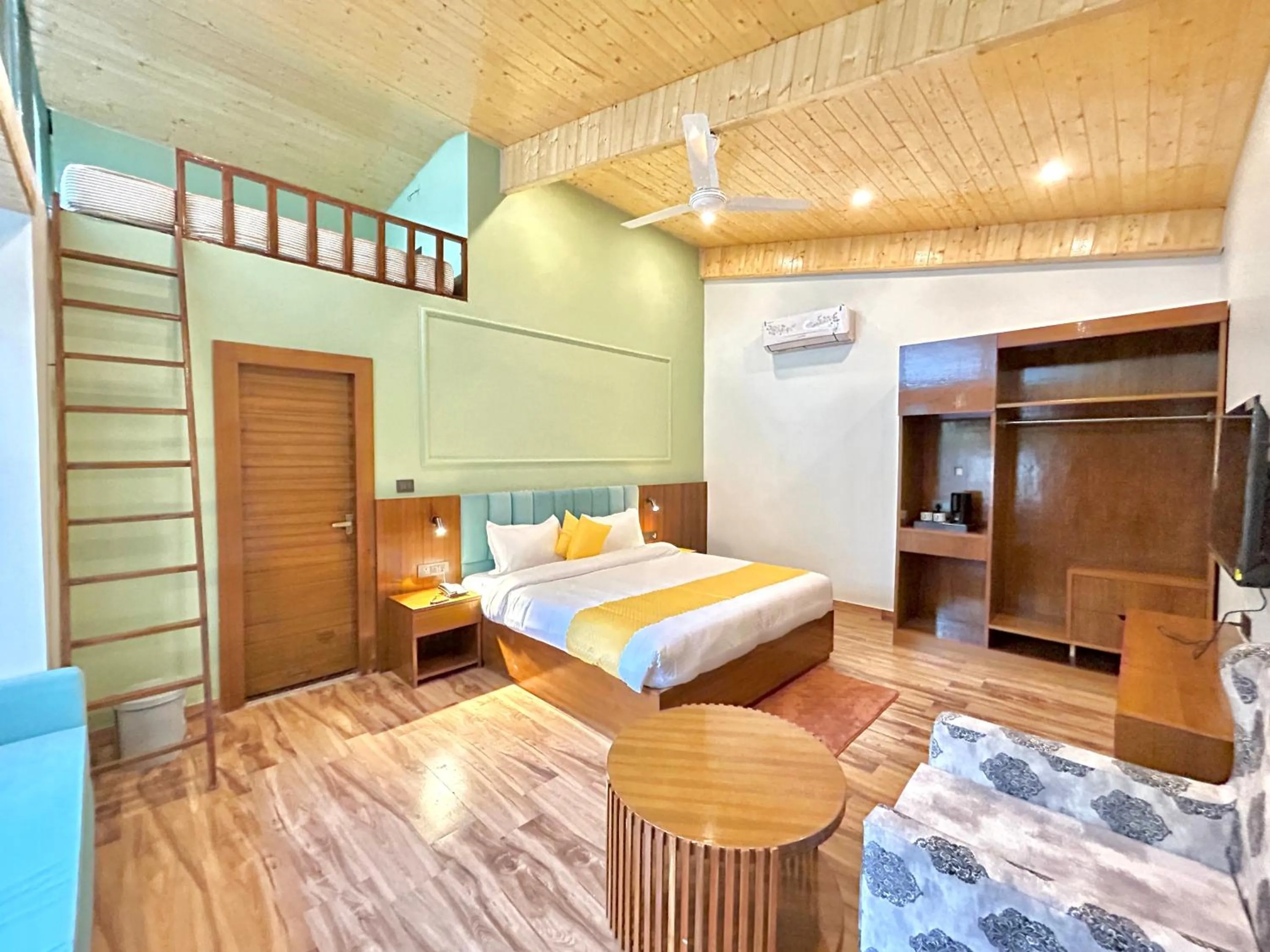 Photo of the whole room, Bed in Ravihans Aranyam - Resort & Restaurant