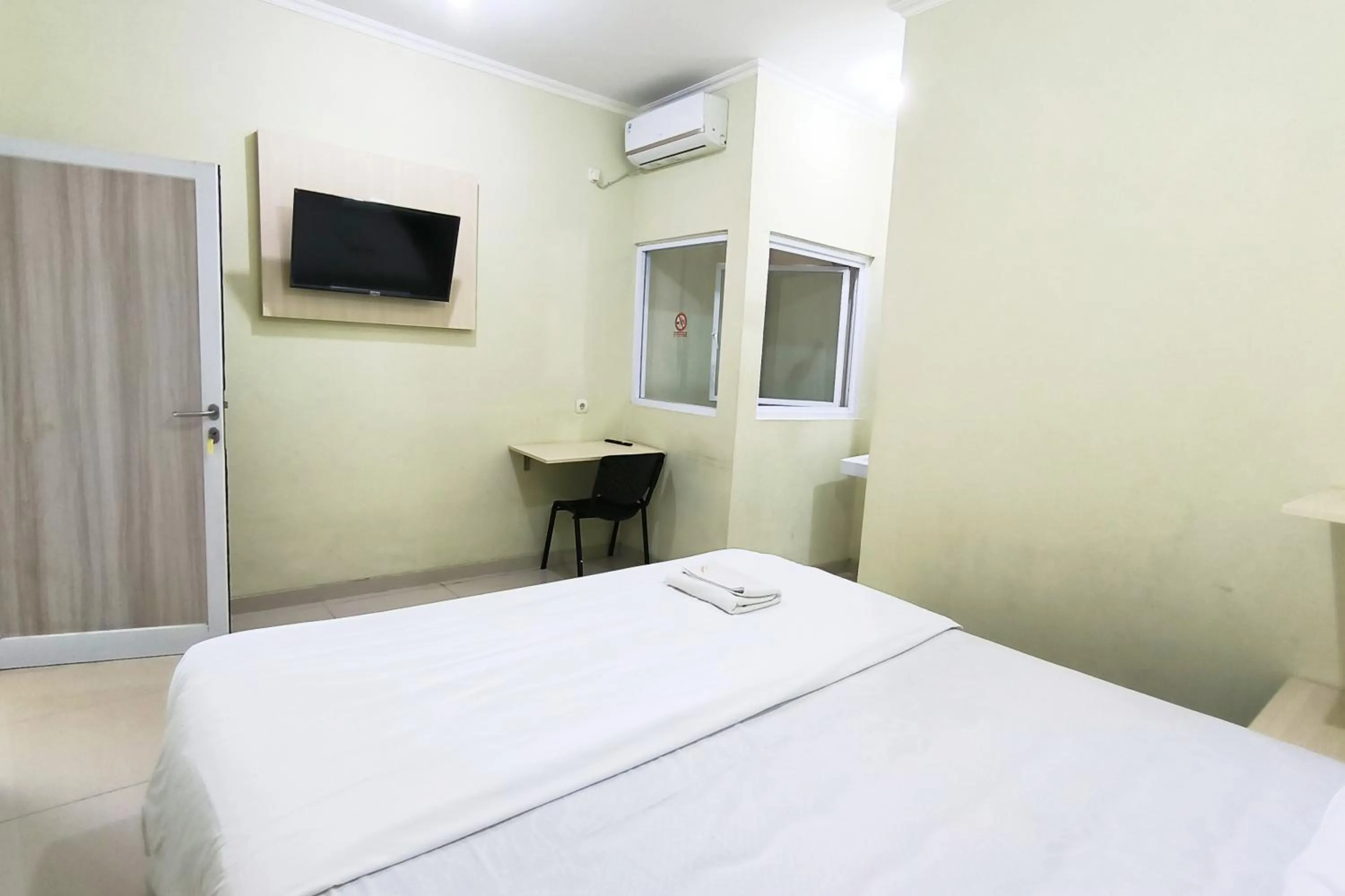 Bed in Tumesa Guesthouse Syariah 2