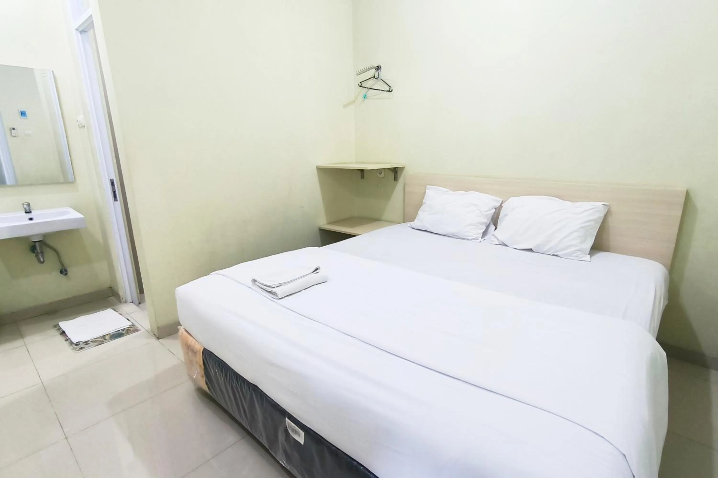 Bed in Tumesa Guesthouse Syariah 2