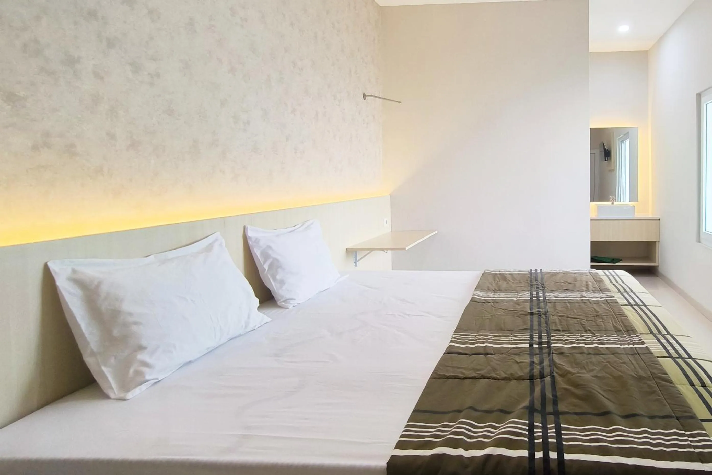 Bed in Tumesa Guesthouse Syariah 2