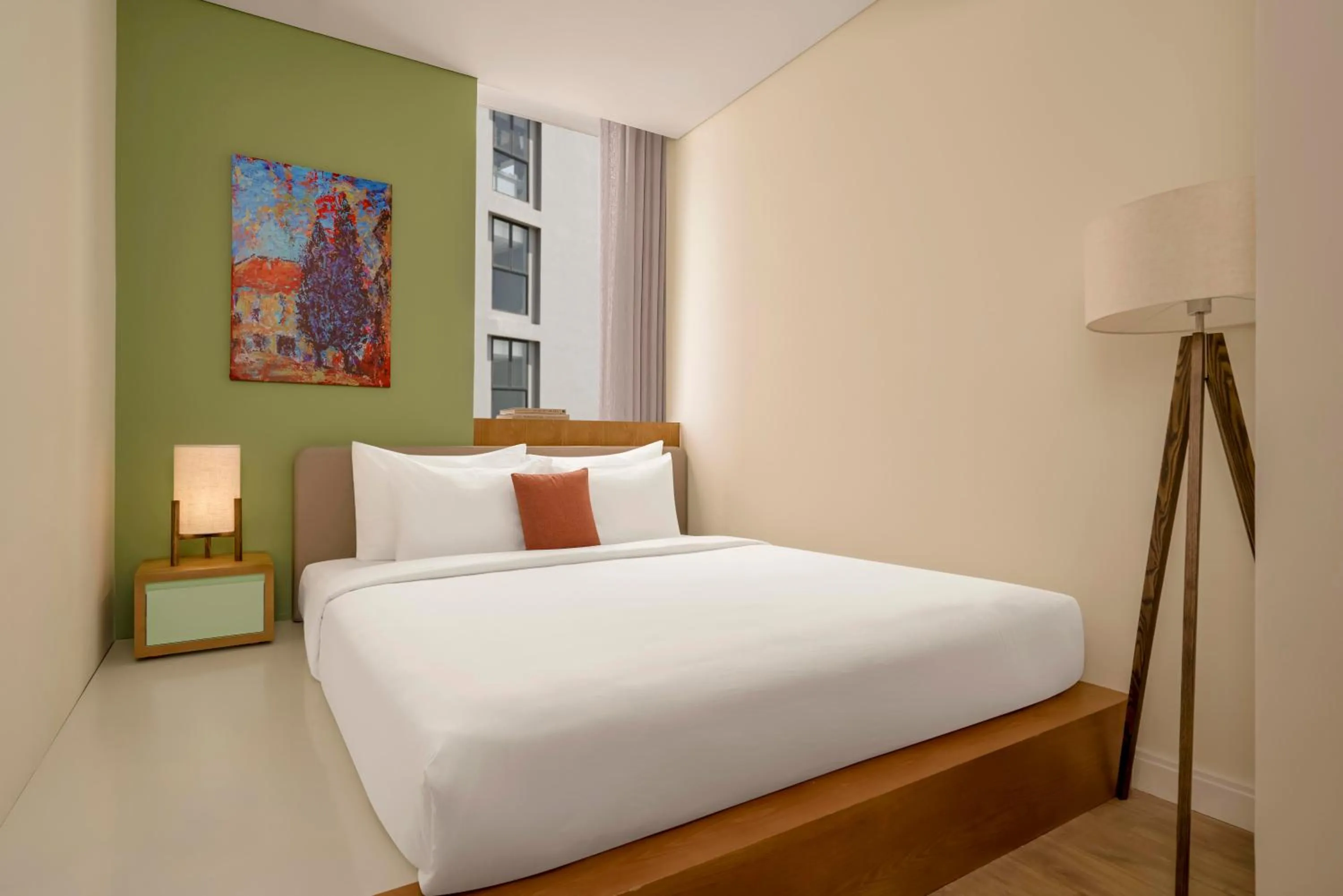 Bed in Signature by M Village Beachfront Hotel