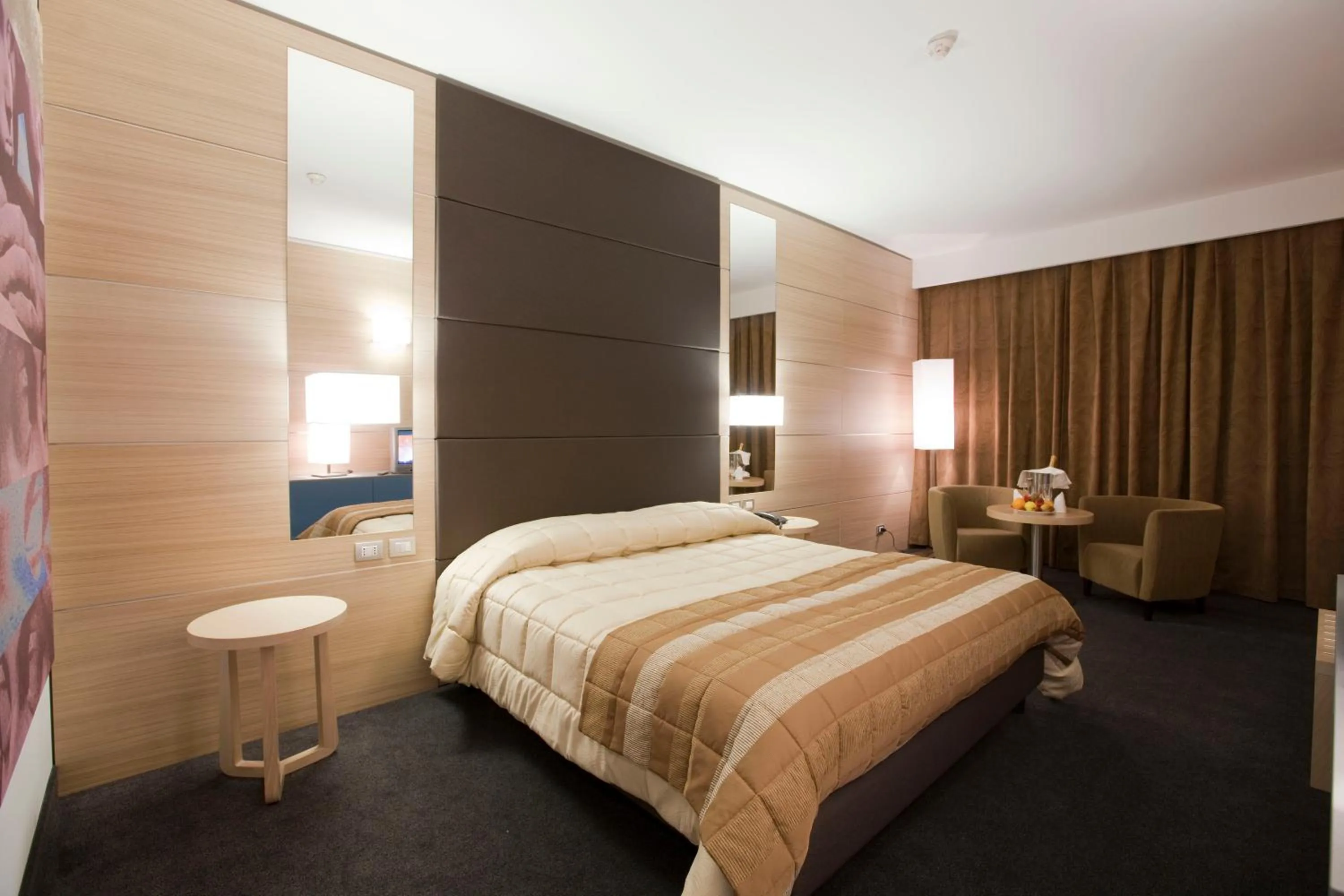 Bed in Centrum Palace Hotel & Resorts