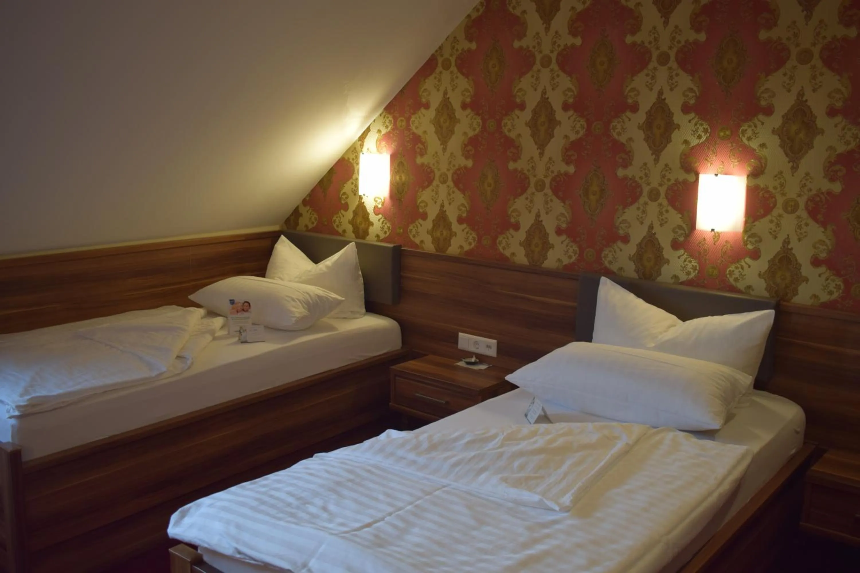 Photo of the whole room, Bed in Akzent Hotel Goldner Hirsch