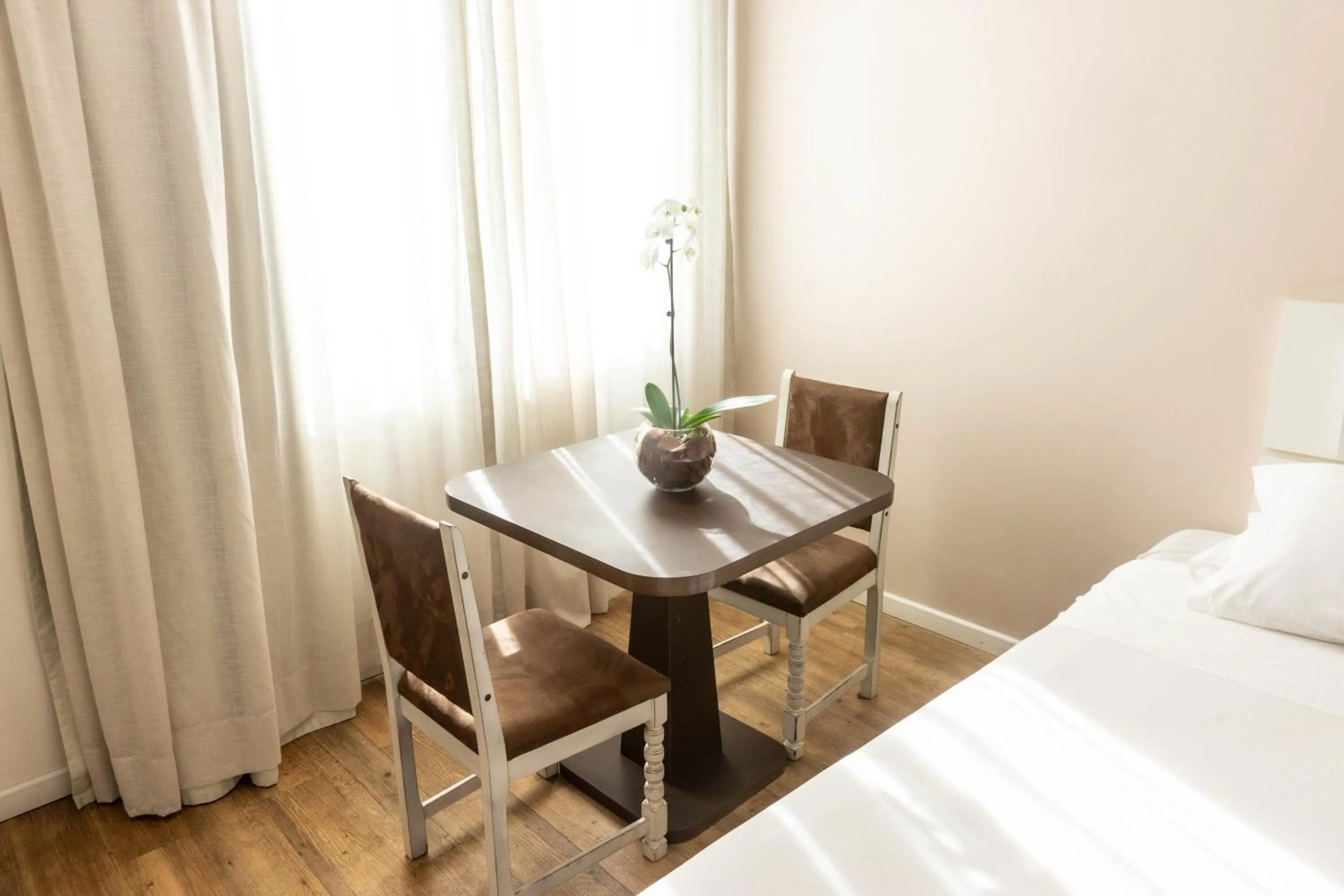 Bed in Plaza São Rafael Hotel