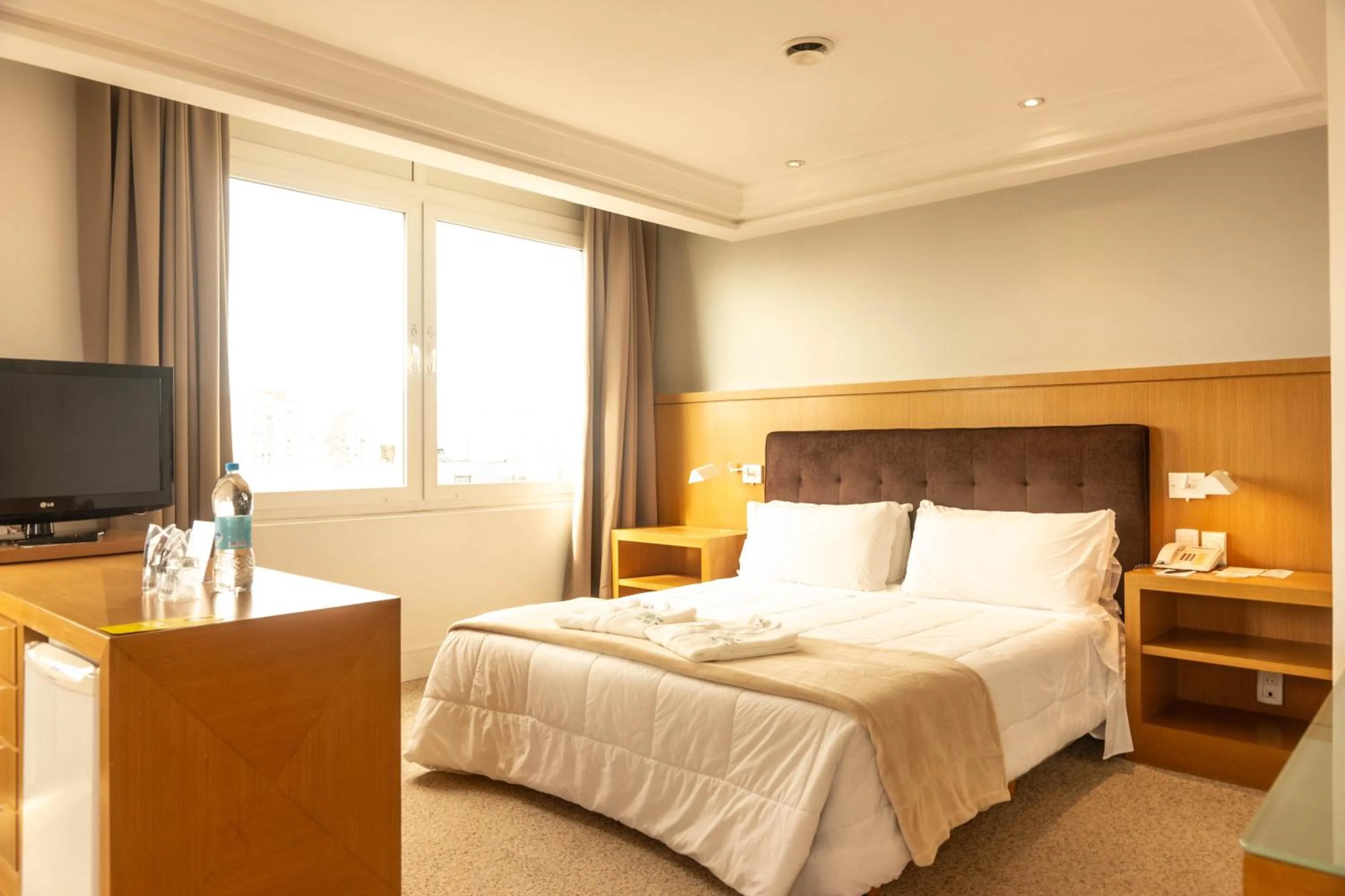 Bed in Plaza São Rafael Hotel