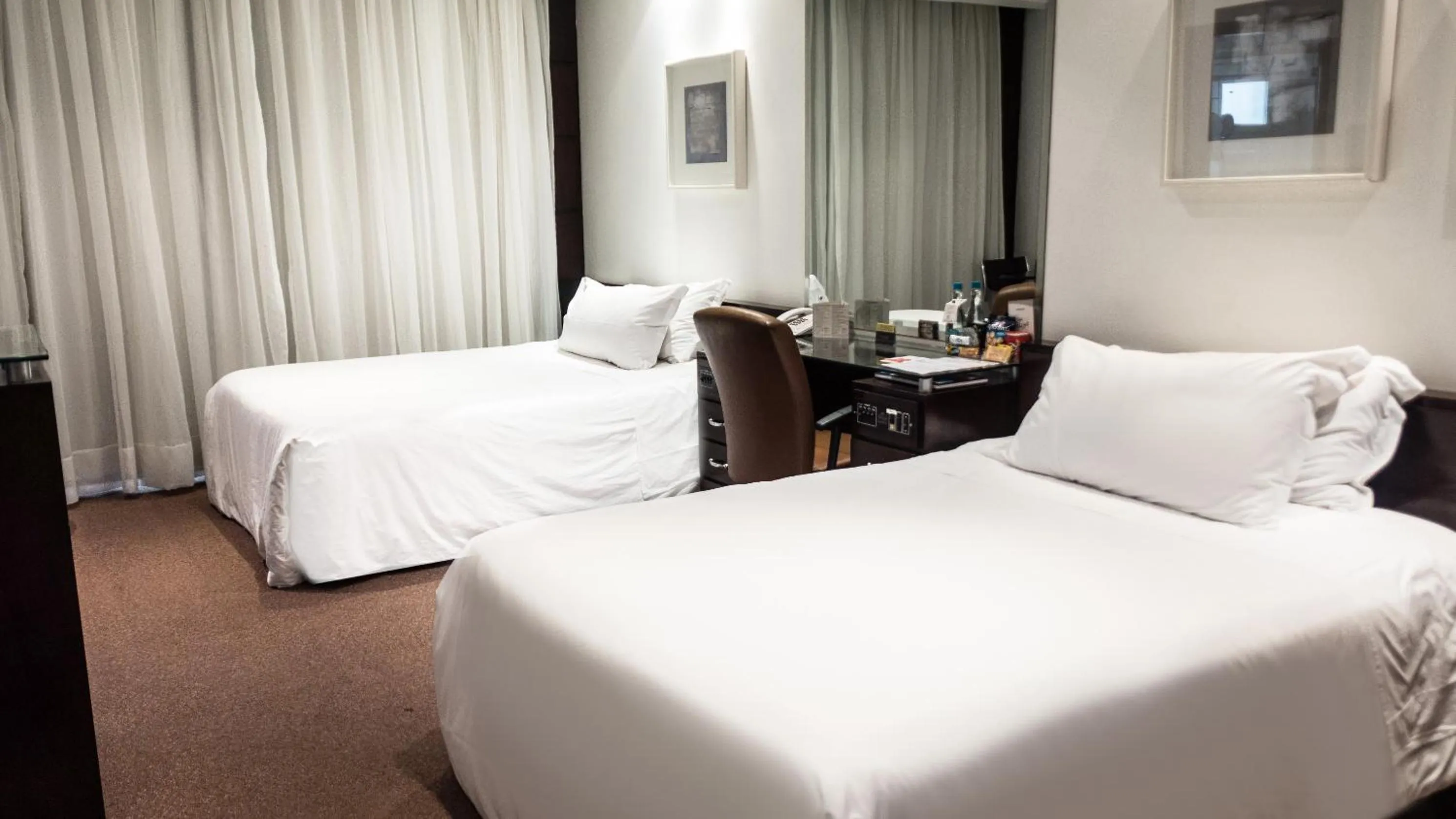 Bed in Plaza São Rafael Hotel