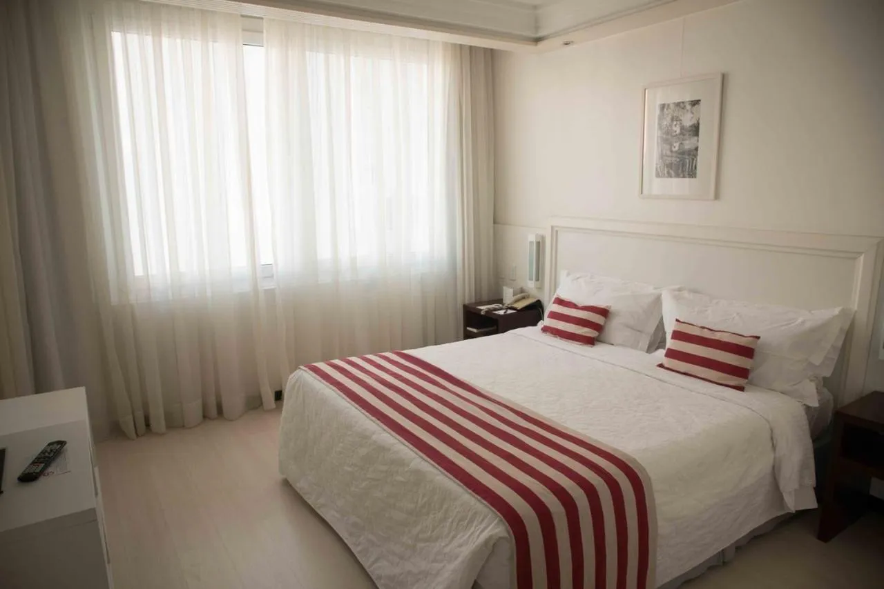 Bed in Plaza São Rafael Hotel