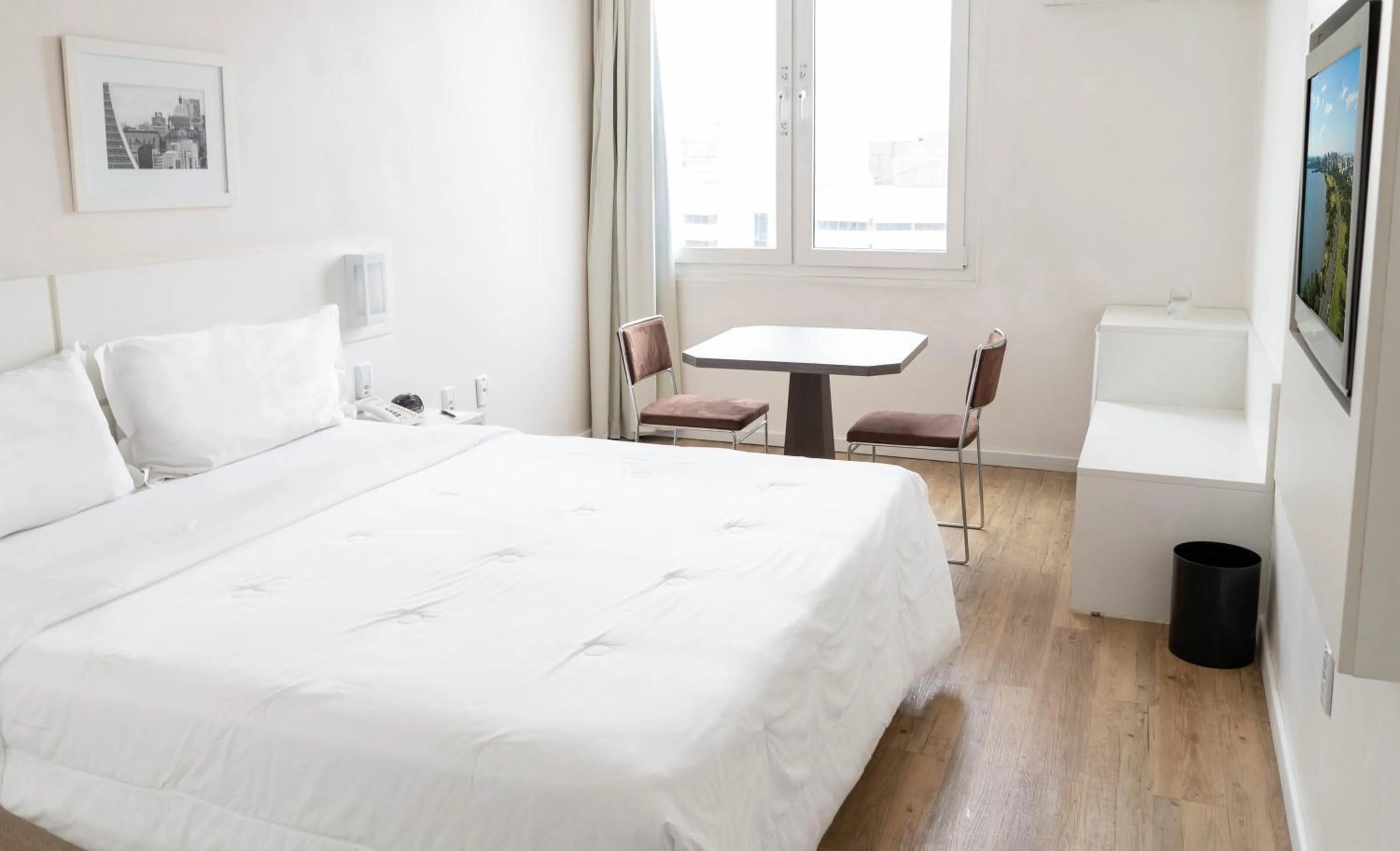 Bed in Plaza São Rafael Hotel