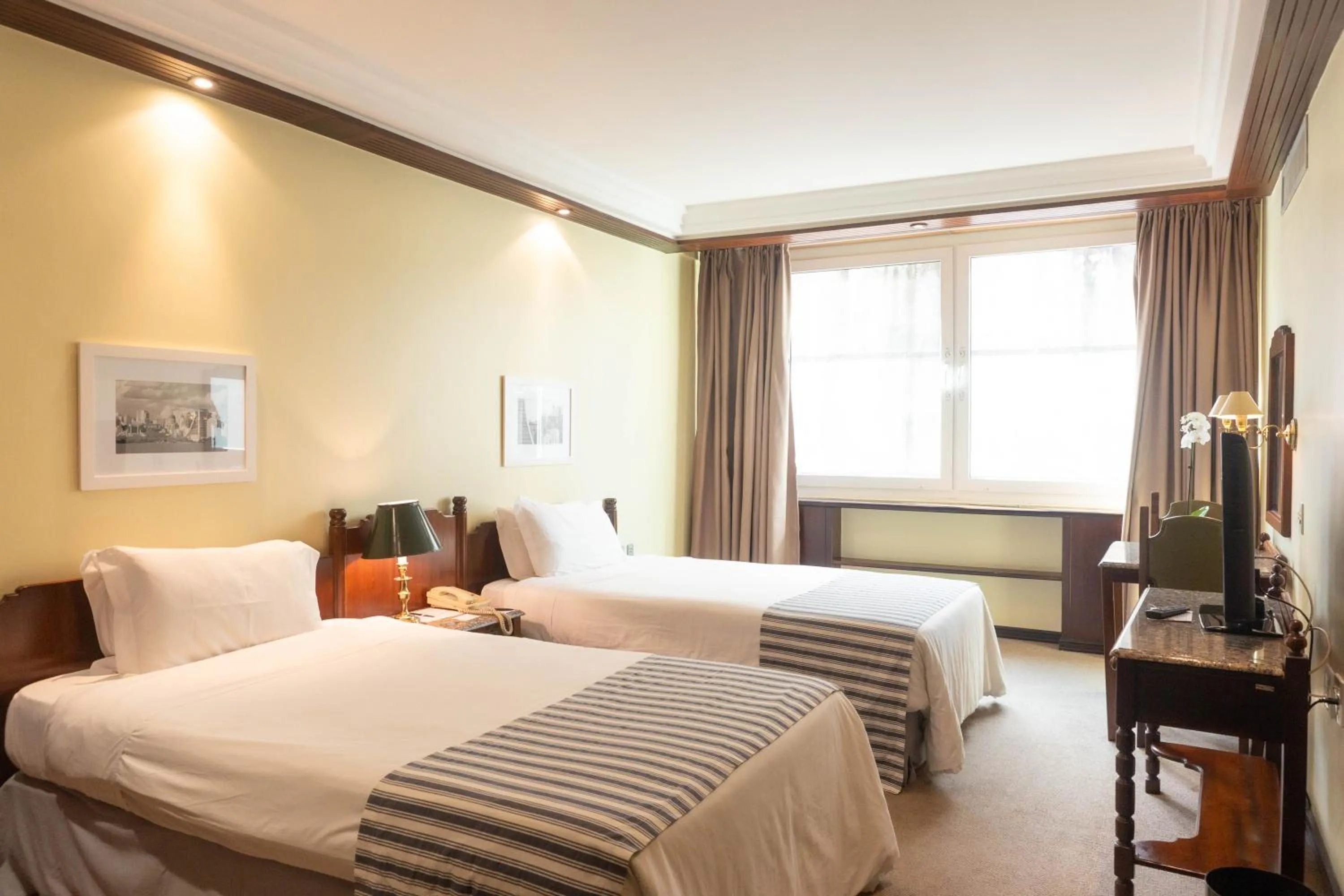 Bed in Plaza São Rafael Hotel