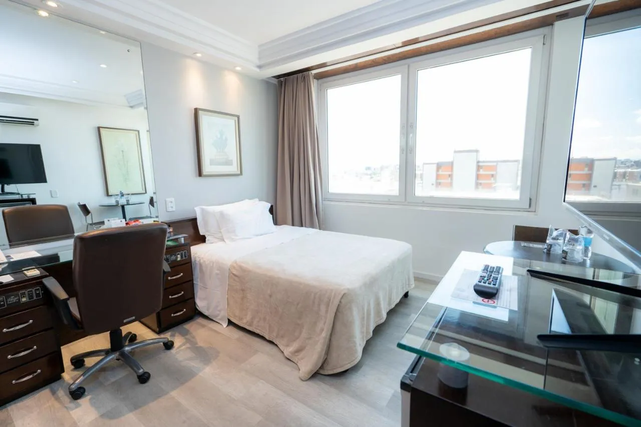 Bed in Plaza São Rafael Hotel