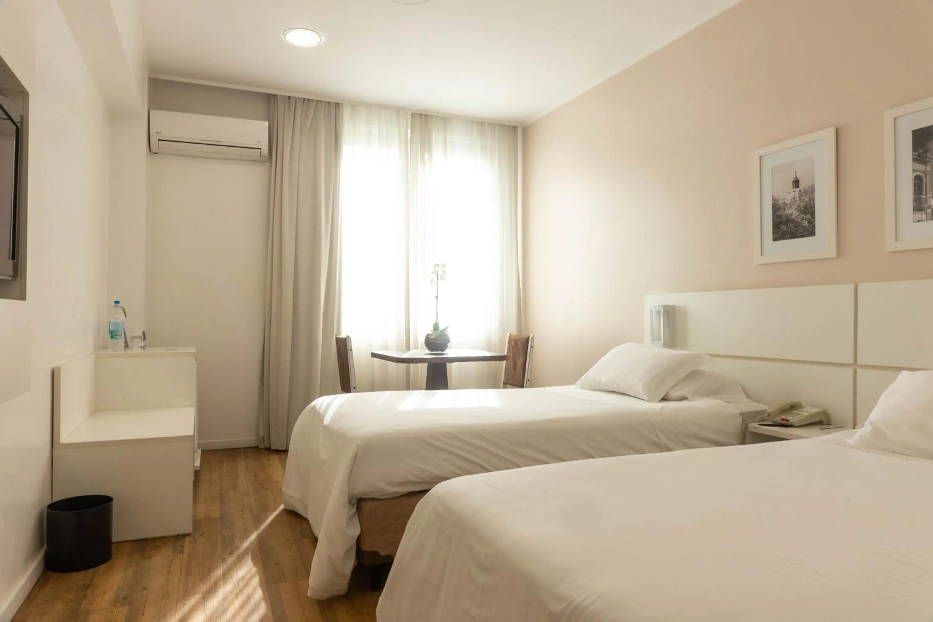 Bed in Plaza São Rafael Hotel