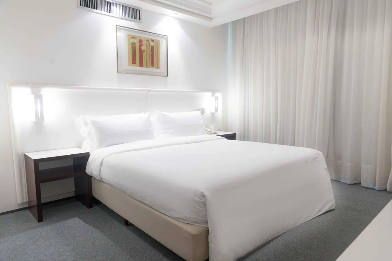 Bed in Plaza São Rafael Hotel