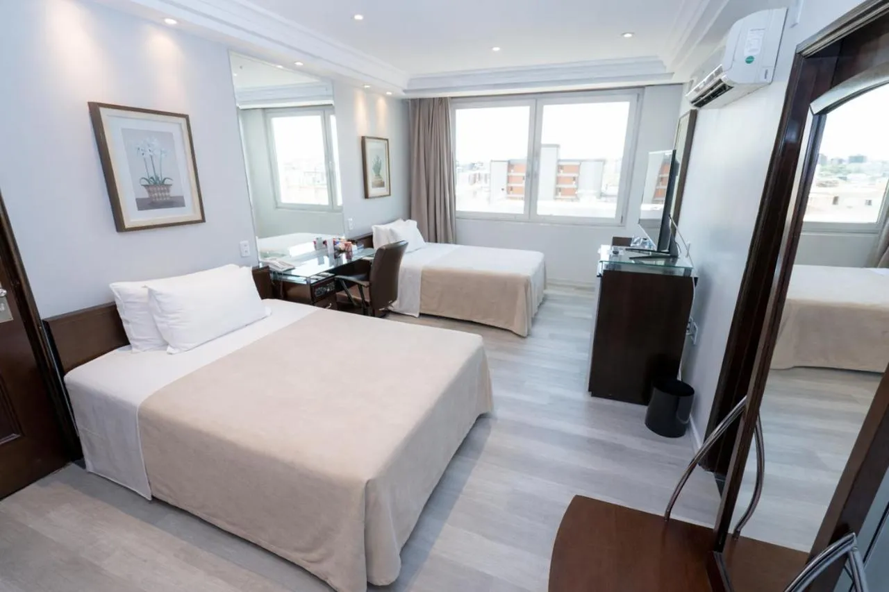 Bed in Plaza São Rafael Hotel