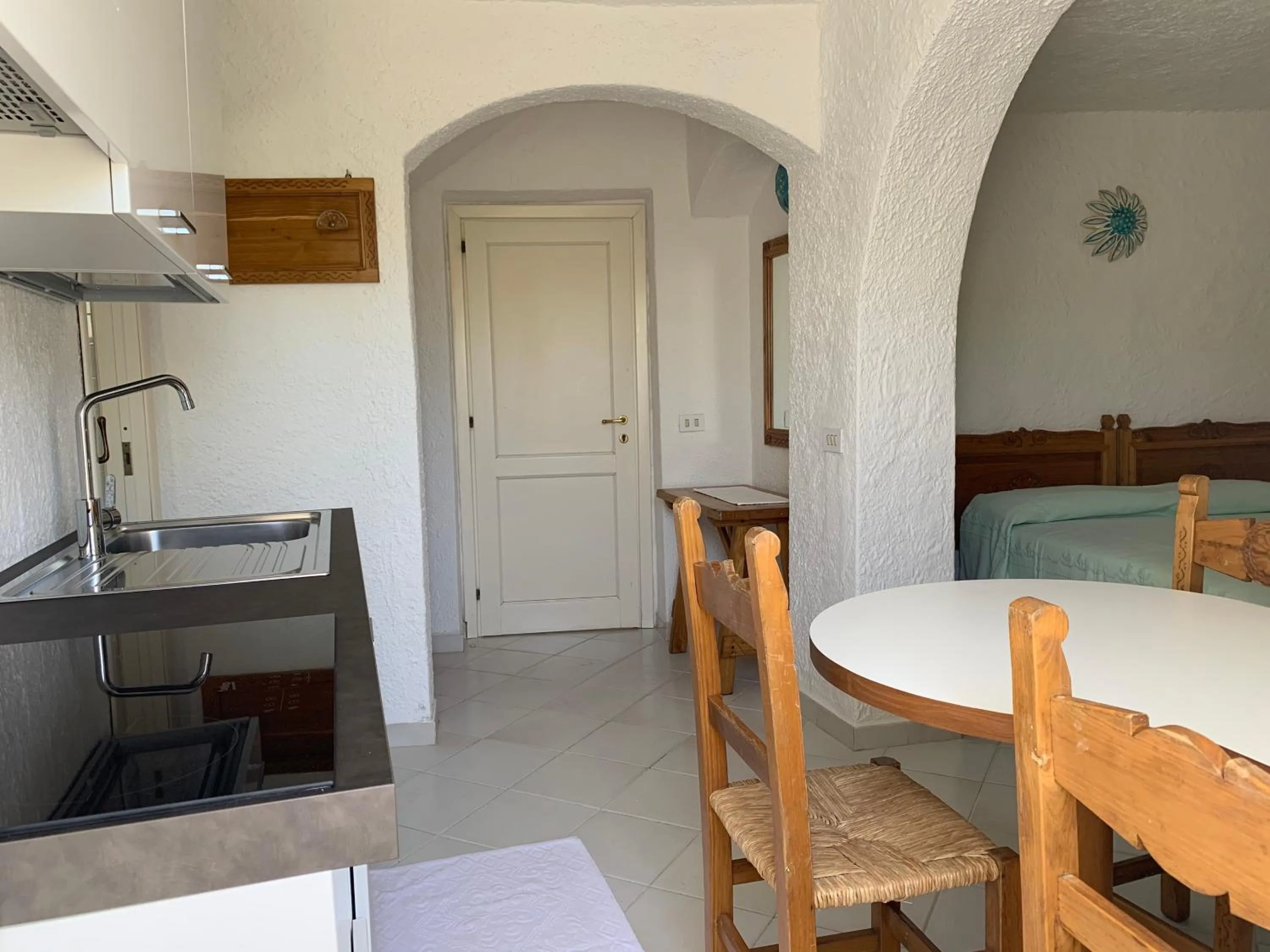 Kitchen or kitchenette, Bed in Hotel Punta Est