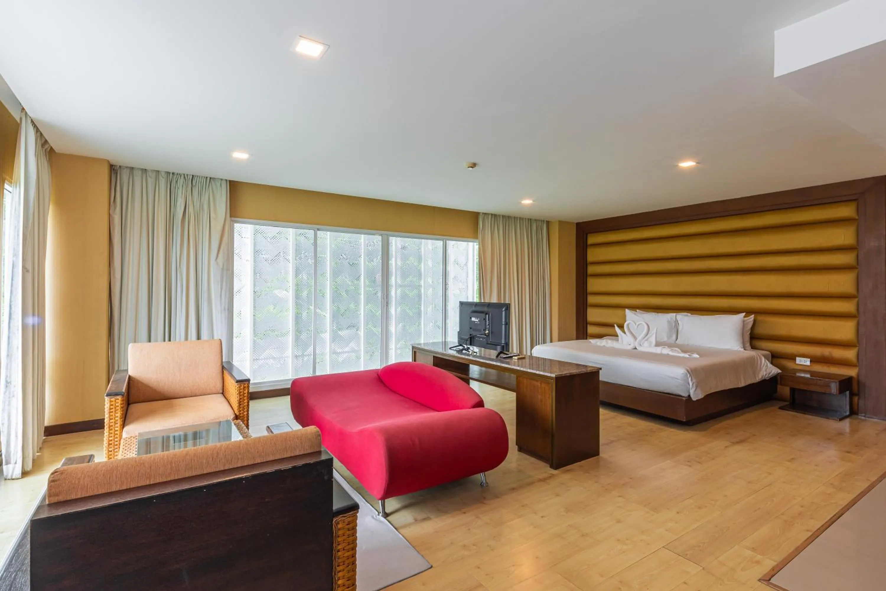 Bed in The Kris Resort Hotel