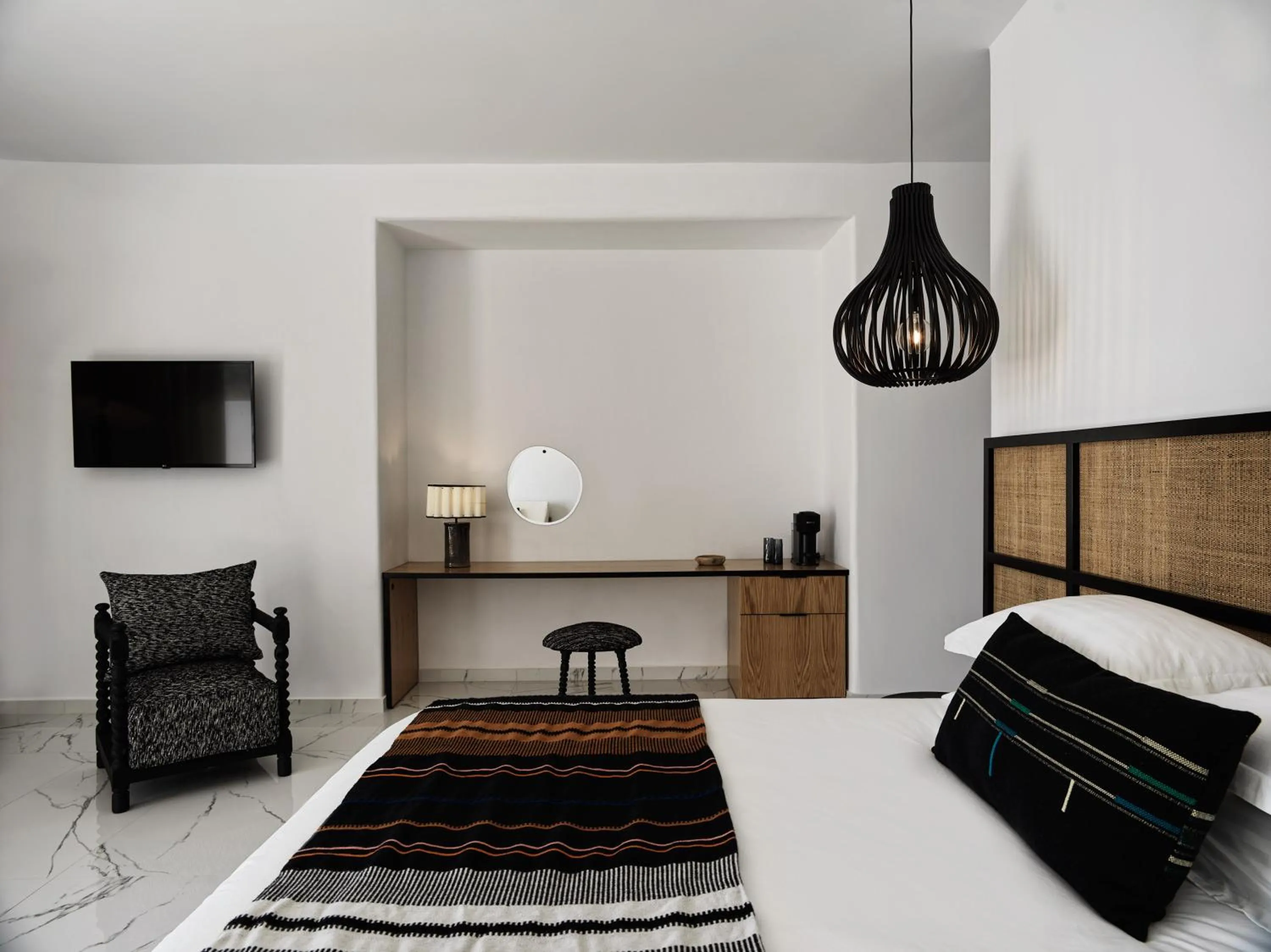 Bed in Kouros Hotel & Suites