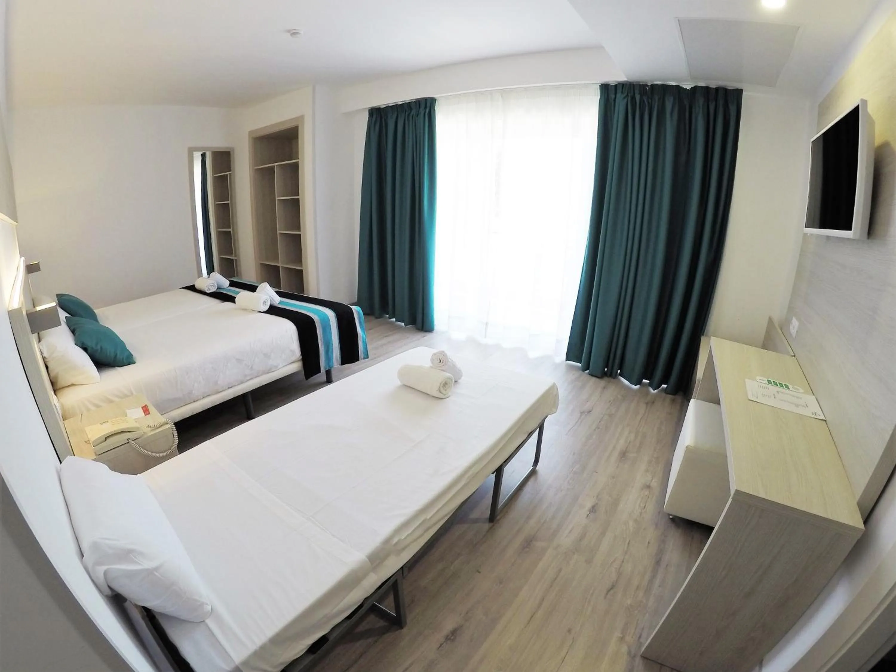 Comfort Triple Room with Pool View in Welikehotel Fenix