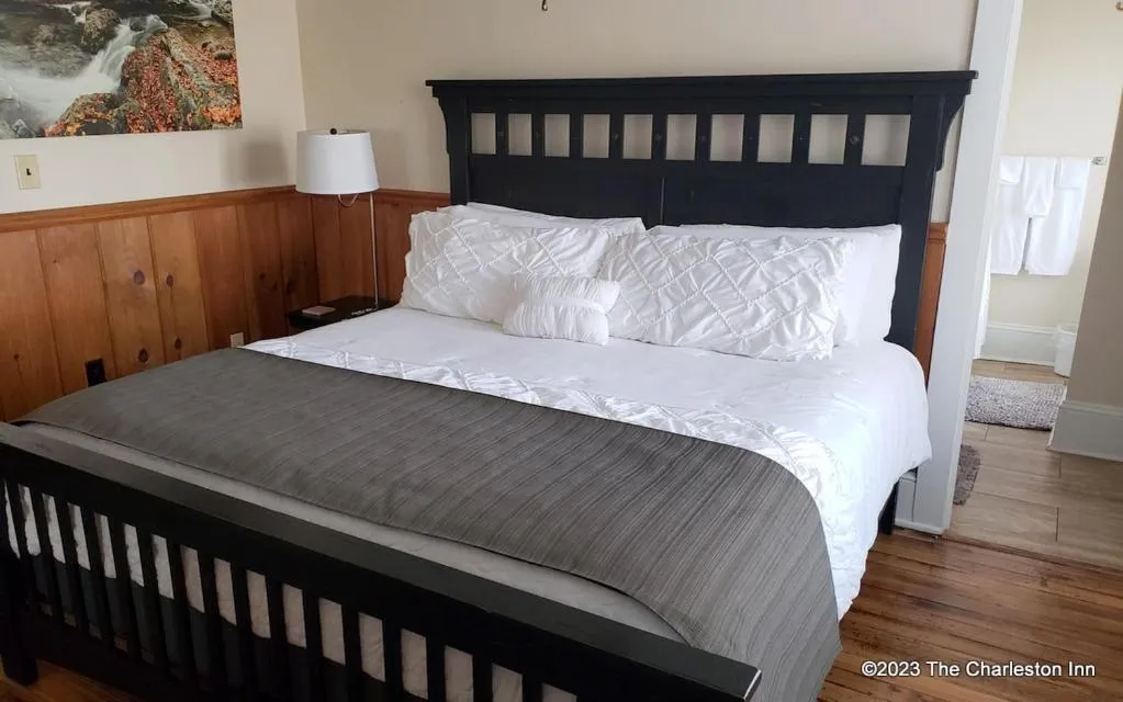 Bed in The Charleston Inn Hendersonville NC