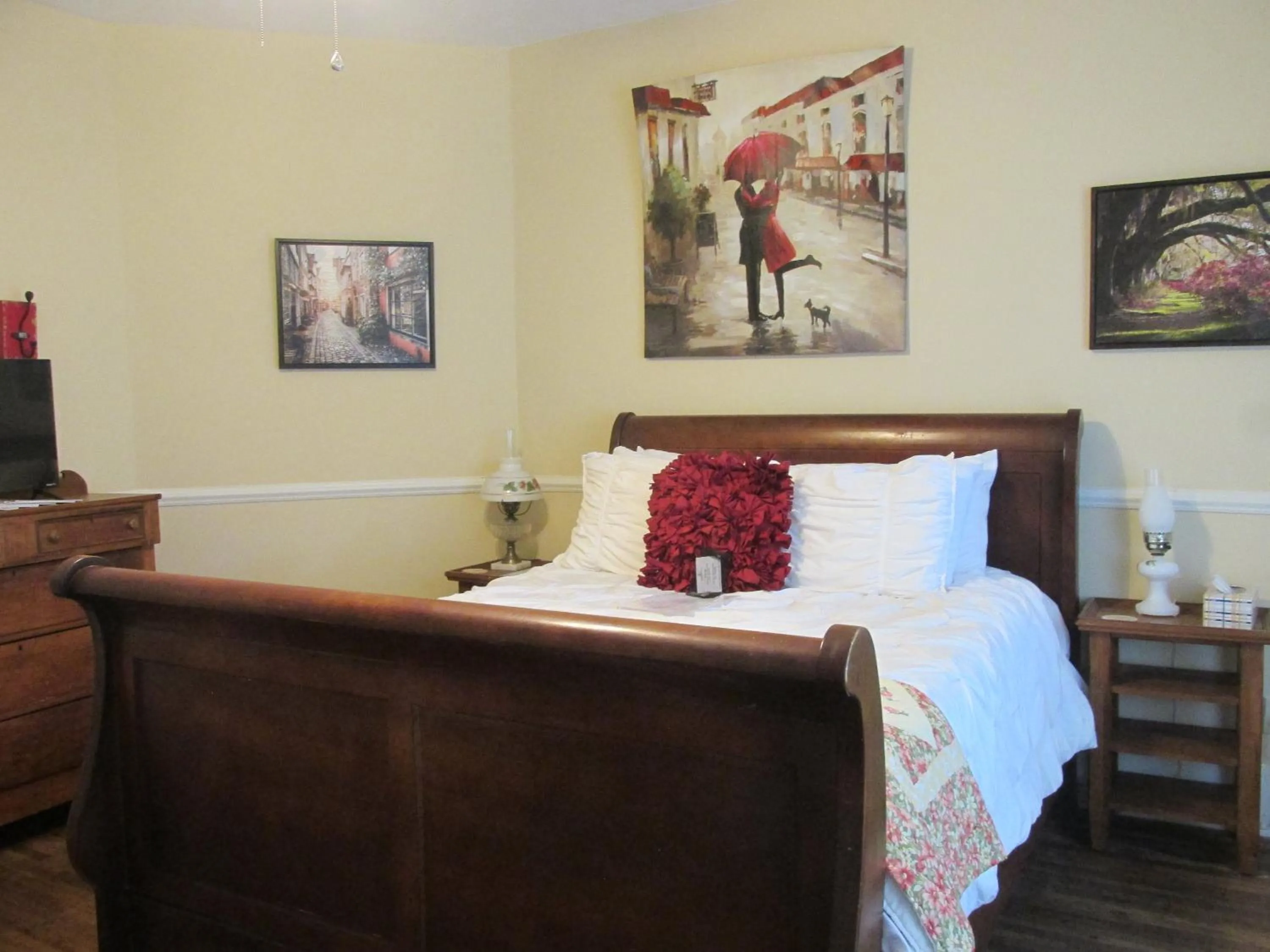 Bed in The Charleston Inn Hendersonville NC