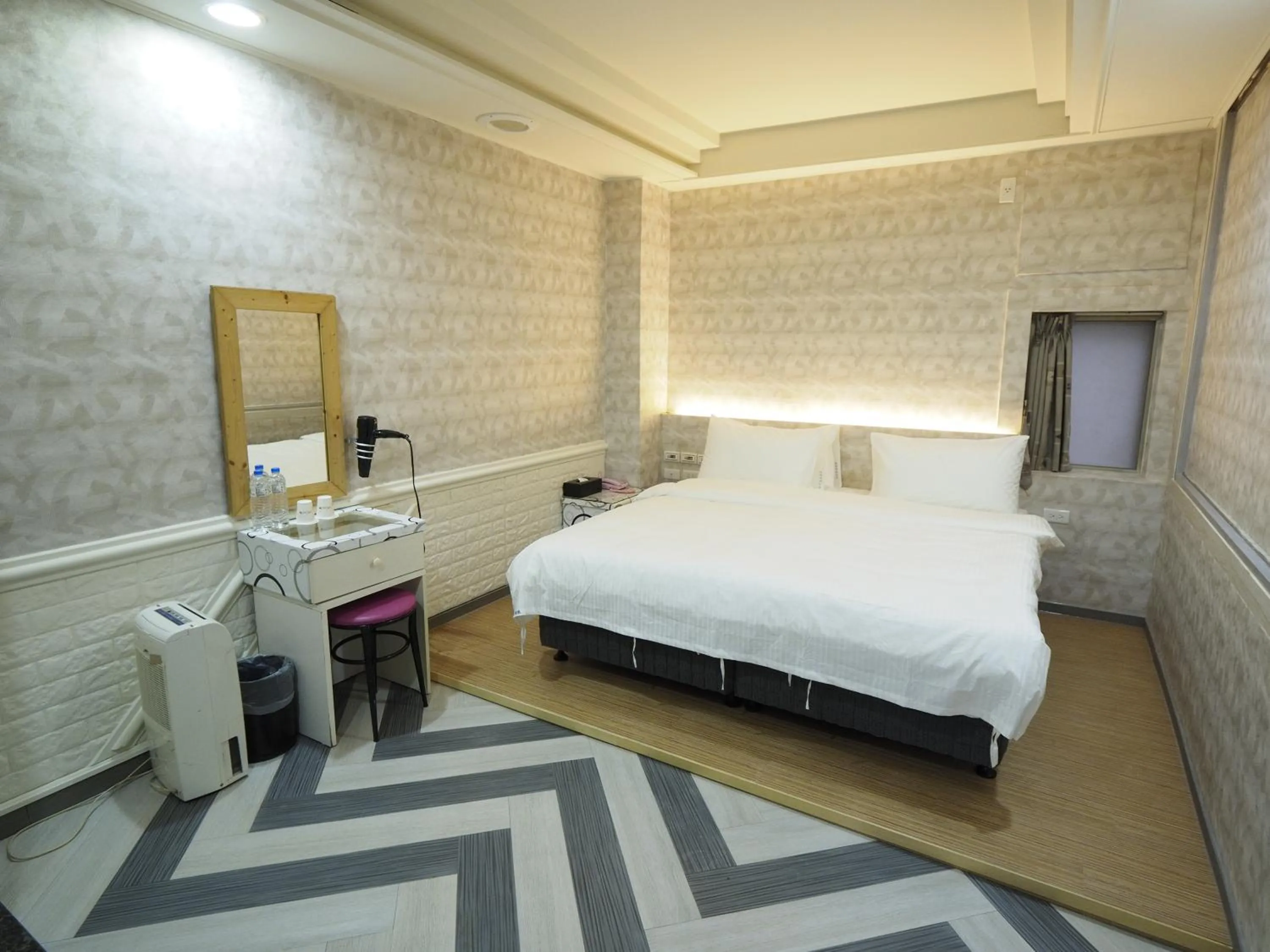 Bed in 合悅都會商旅 Heyue HOTEL