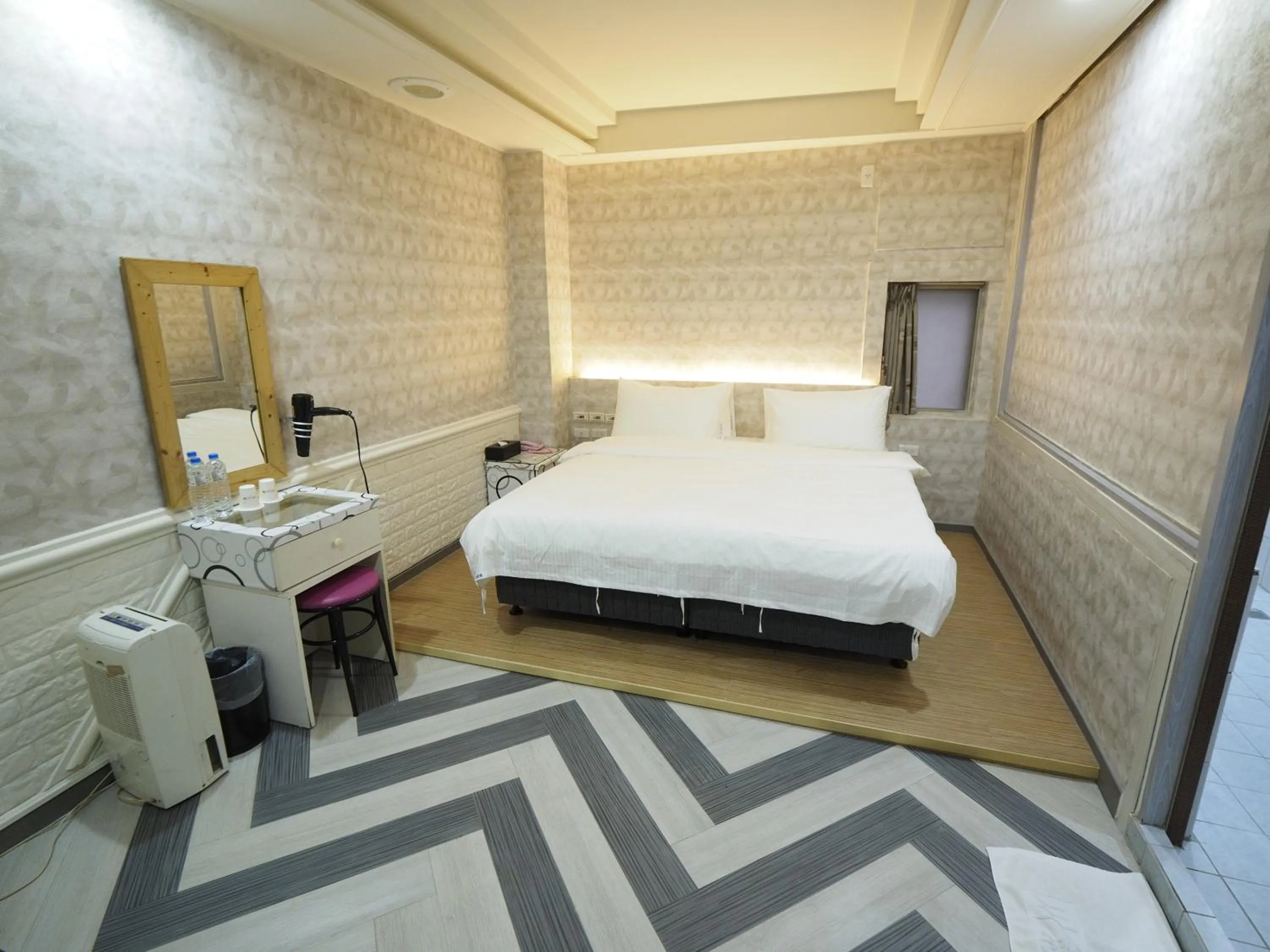 Bed in 合悅都會商旅 Heyue HOTEL