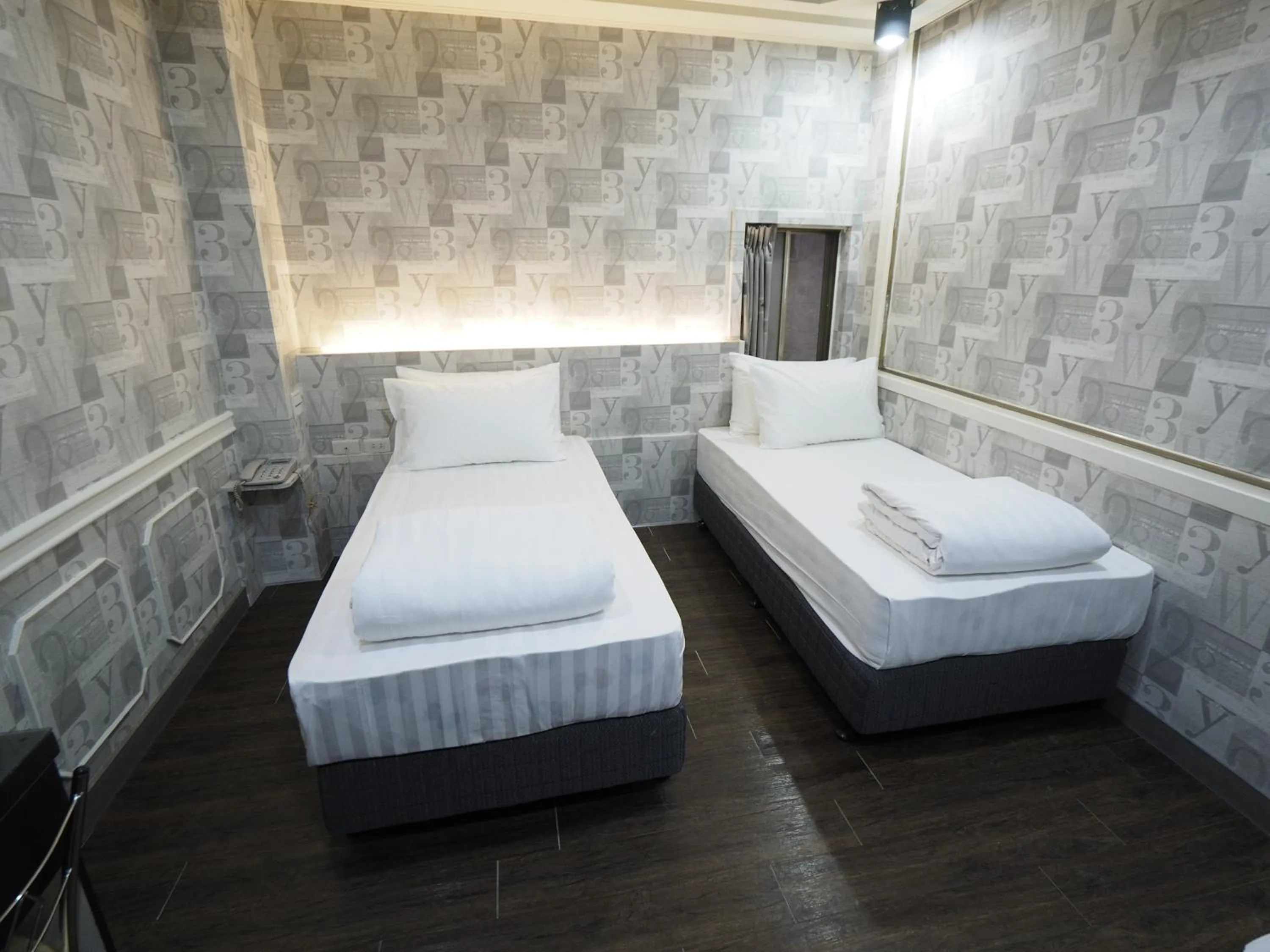 Bed in 合悅都會商旅 Heyue HOTEL