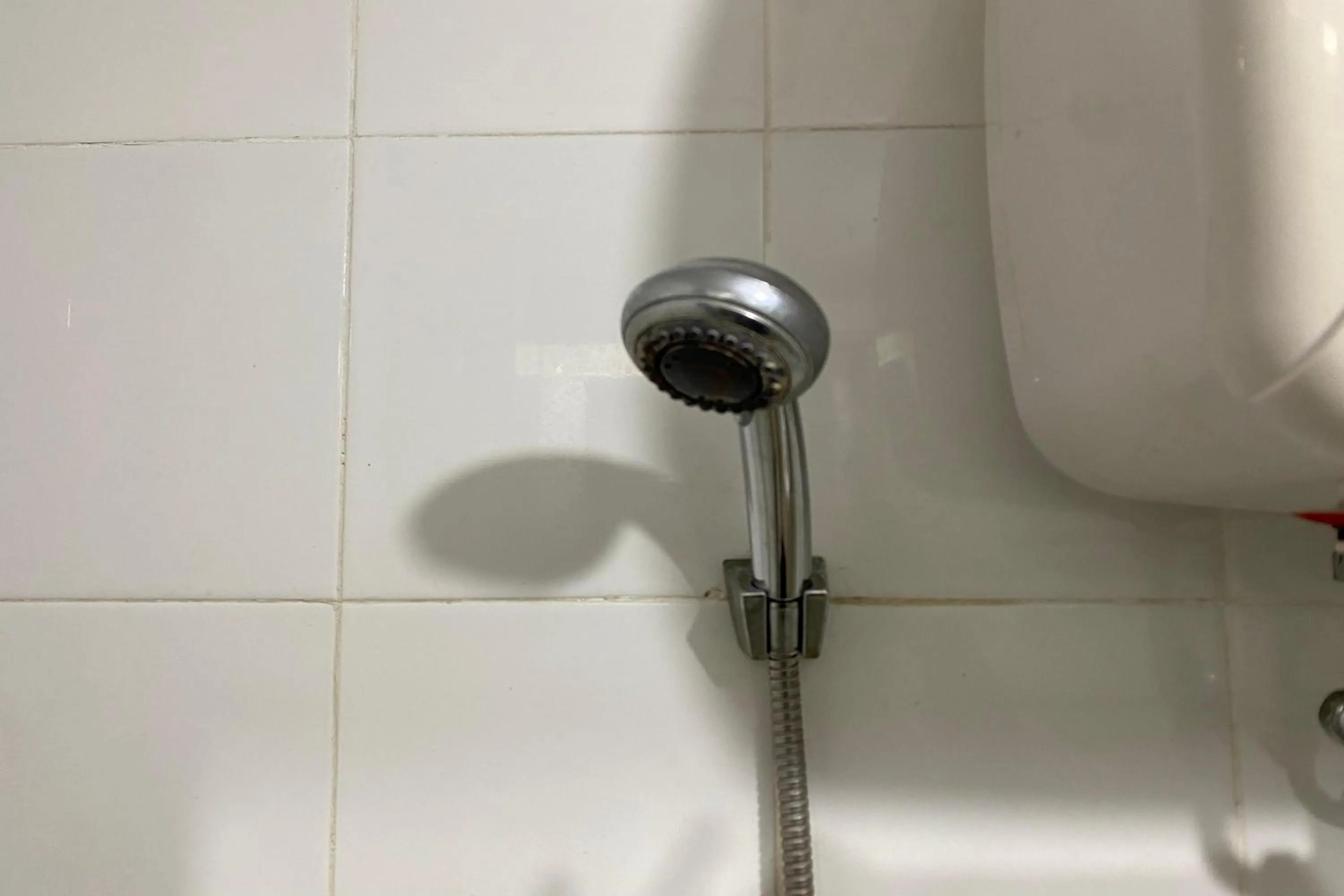 Shower in Apartment Bassura City by Berkah Estate