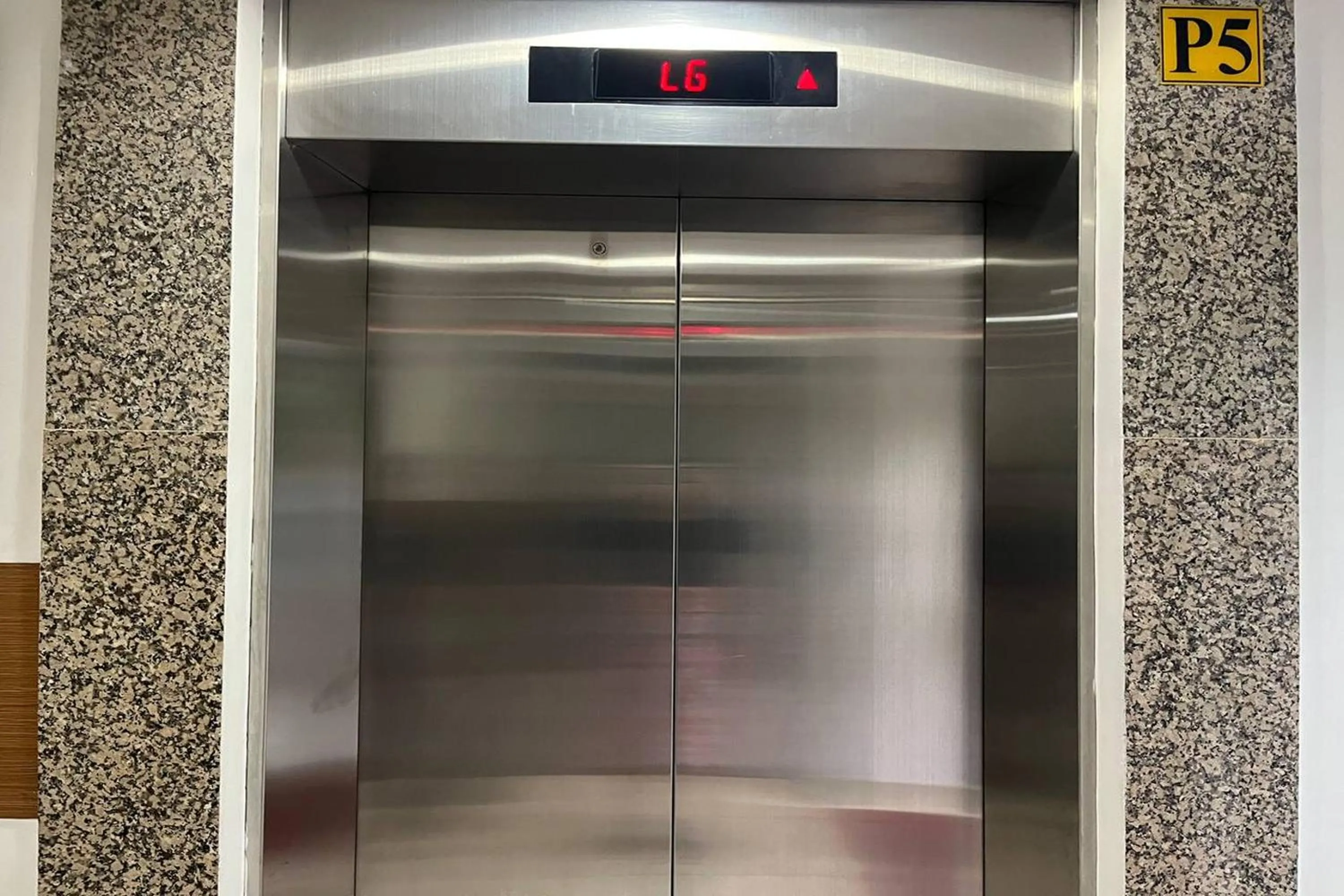 elevator in Apartment Bassura City by Berkah Estate