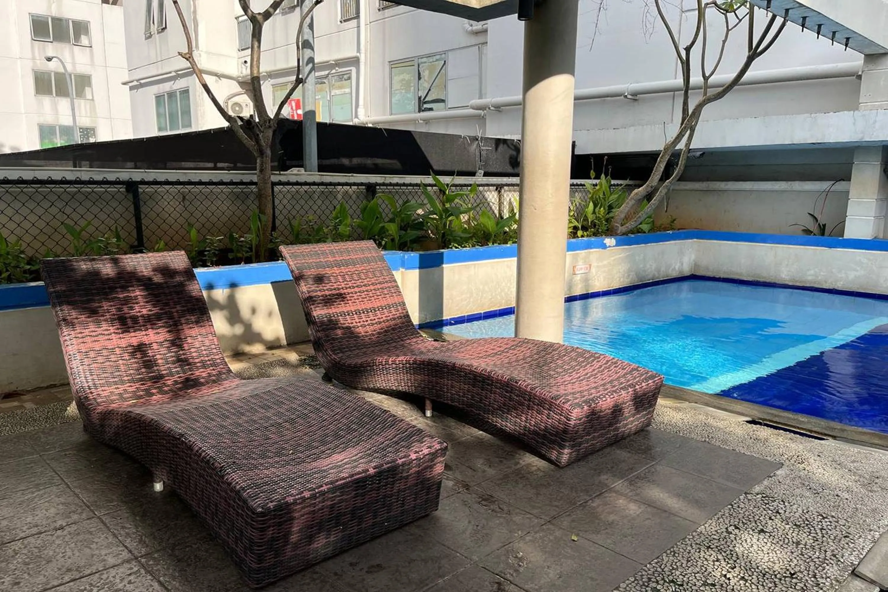 Swimming pool in Apartment Bassura City by Berkah Estate