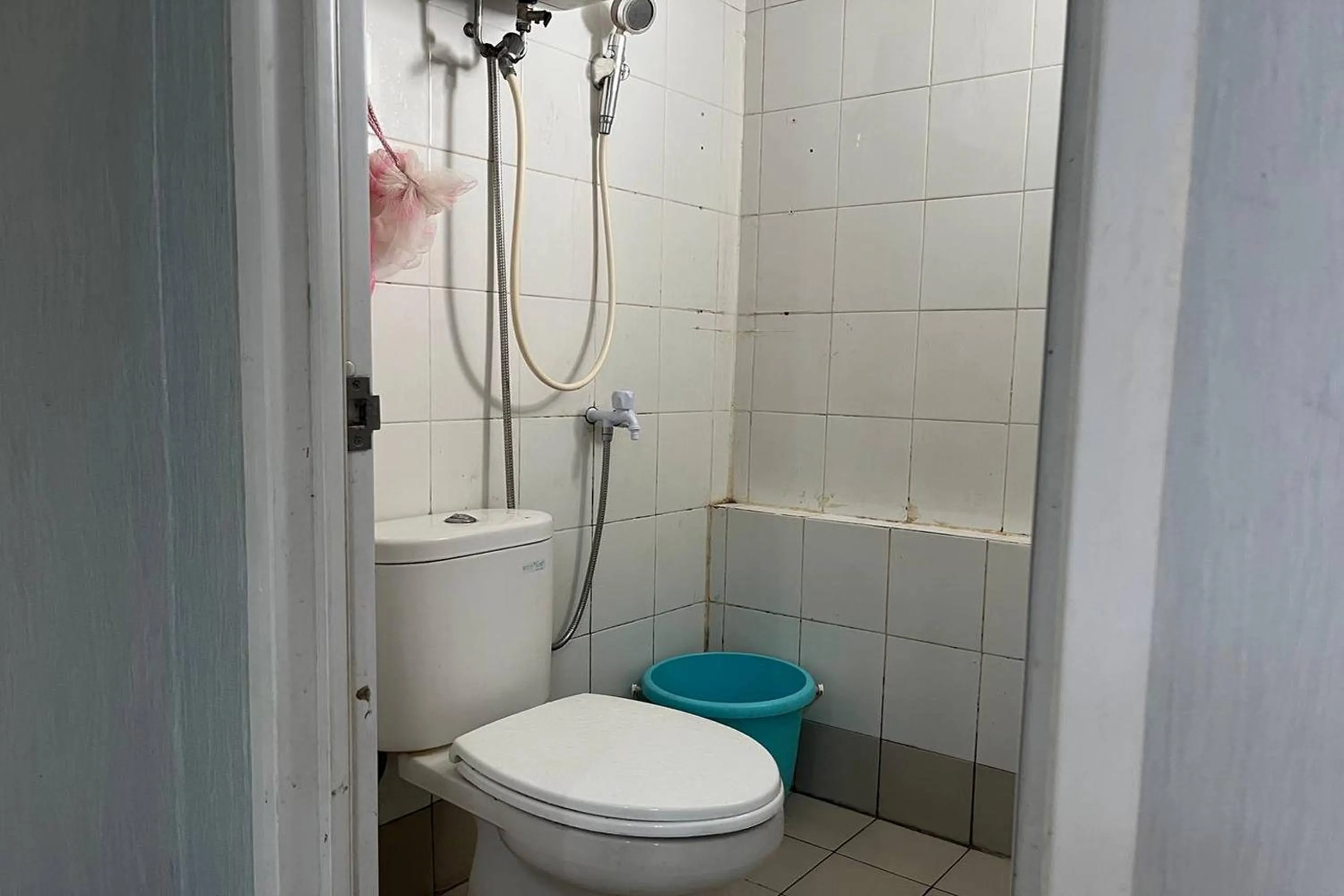 Shower in Apartment Bassura City by Berkah Estate