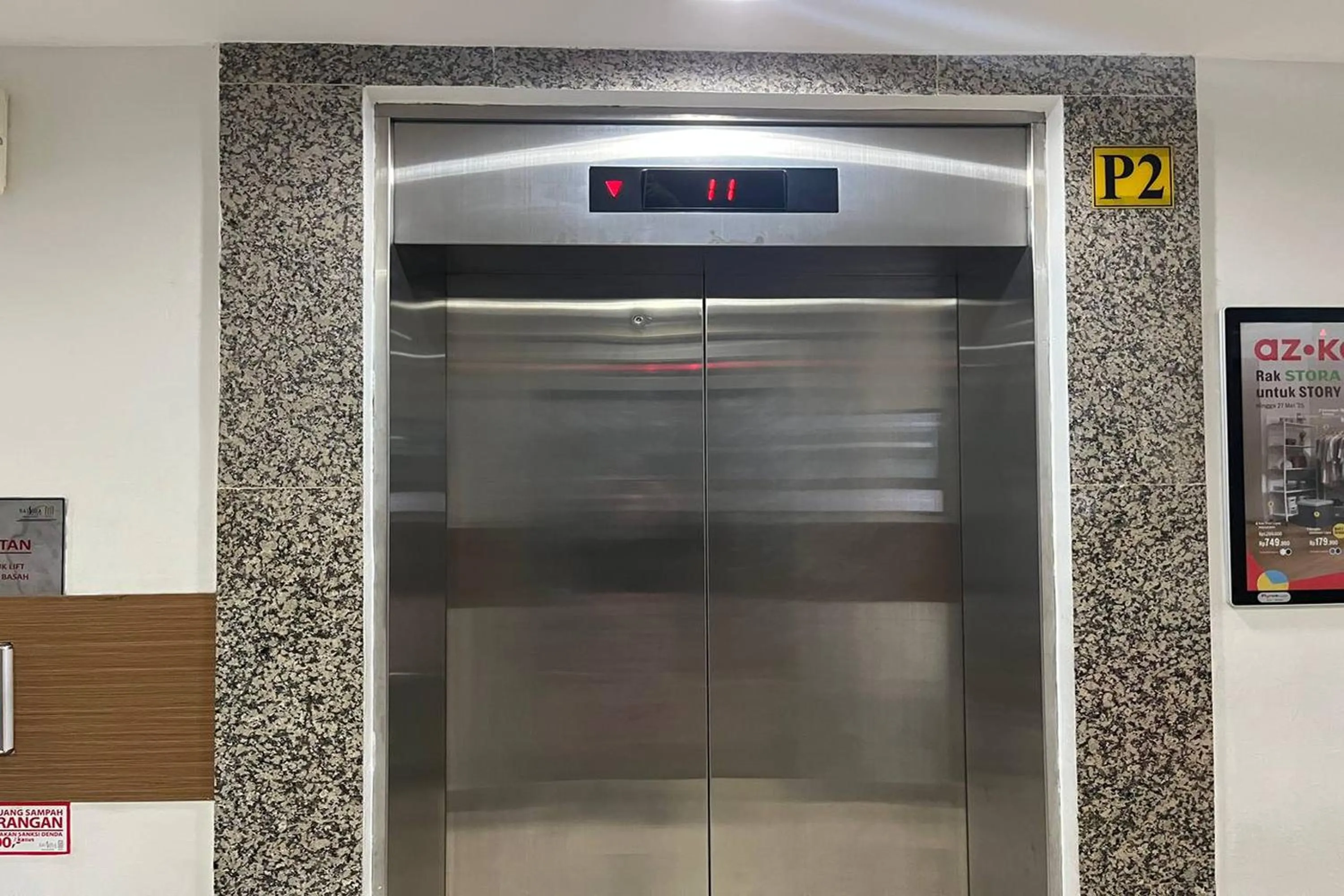 elevator in Apartment Bassura City by Berkah Estate