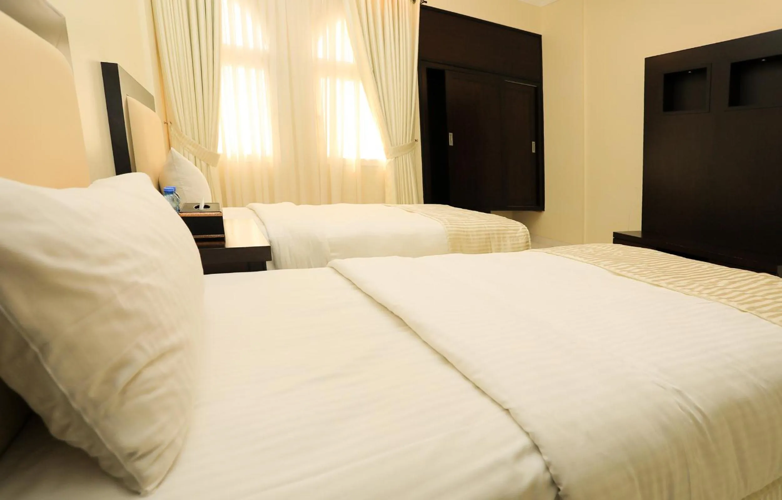 Bedroom, Bed in Remas Hotel Suites - Al Khoudh, Seeb, Muscat