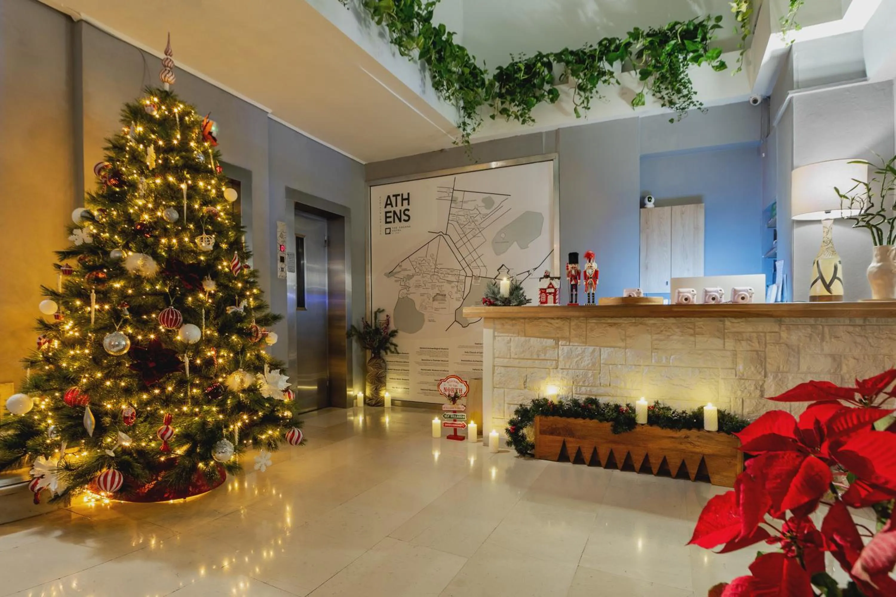 Lobby or reception in The Square Hotel by X&N