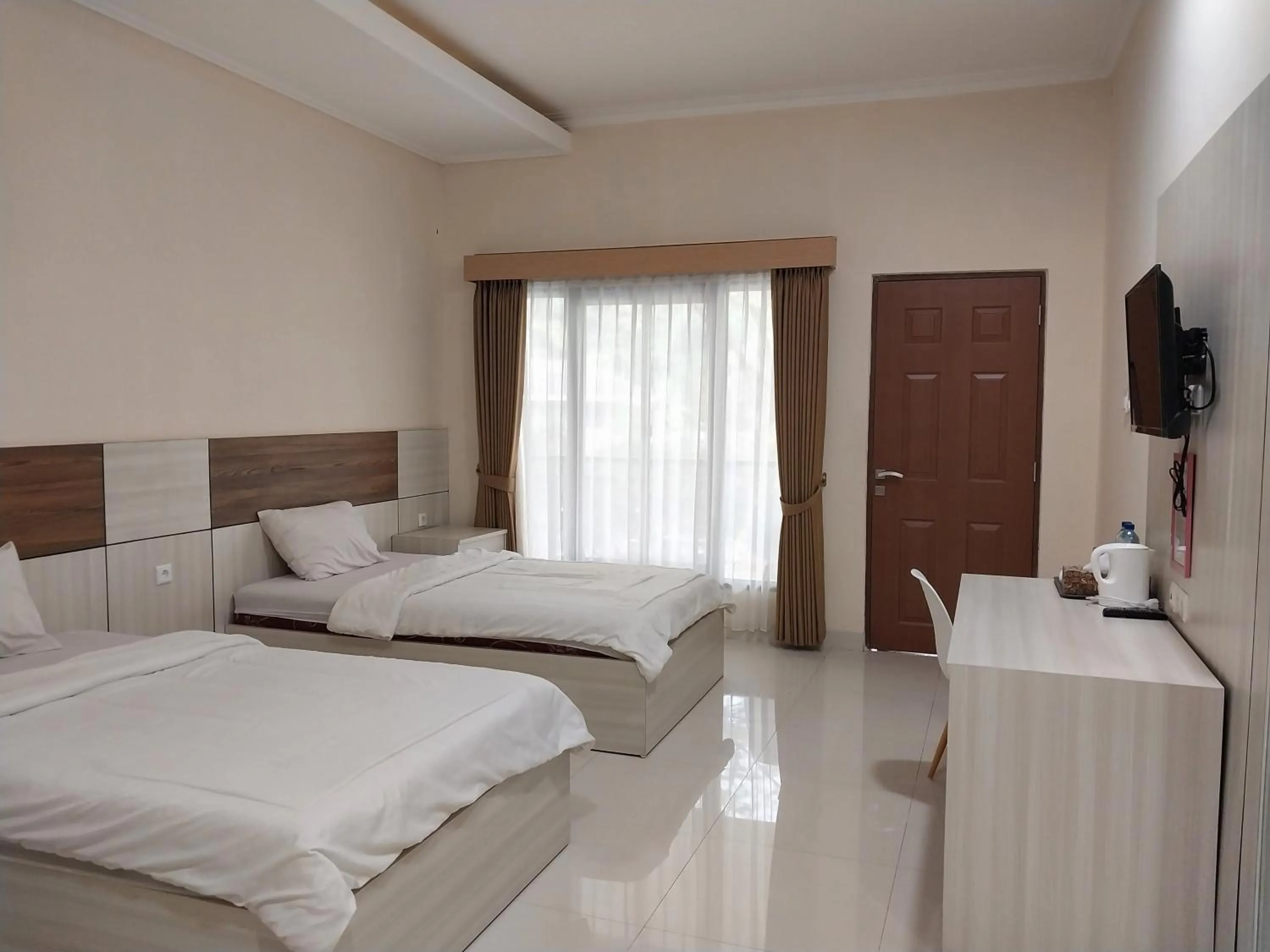 Bed in Saung Dolken Syariah Resort & Hotel