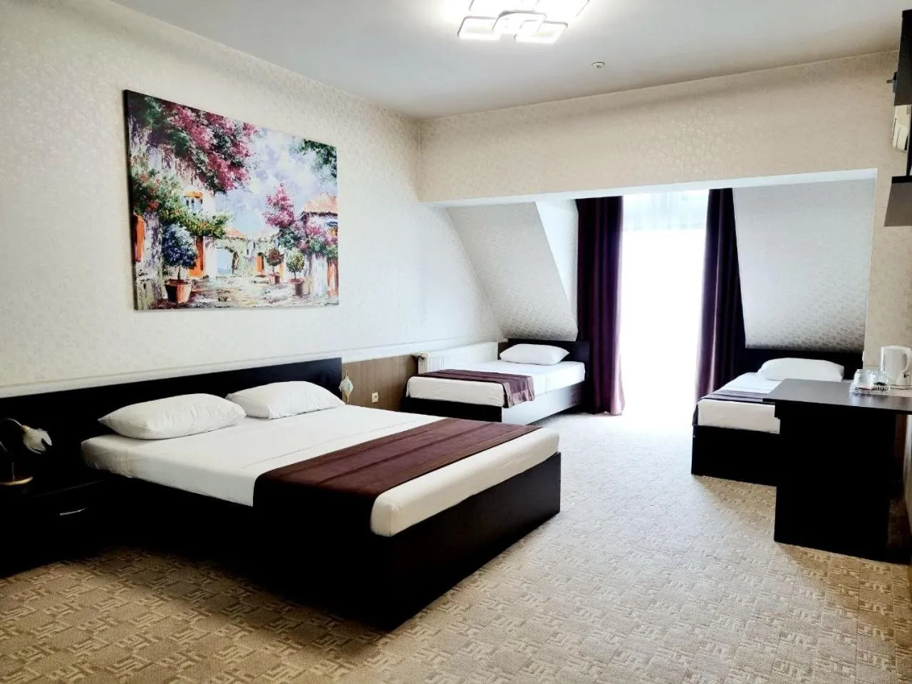 Bed in TipTop Hotel CITY CENTER