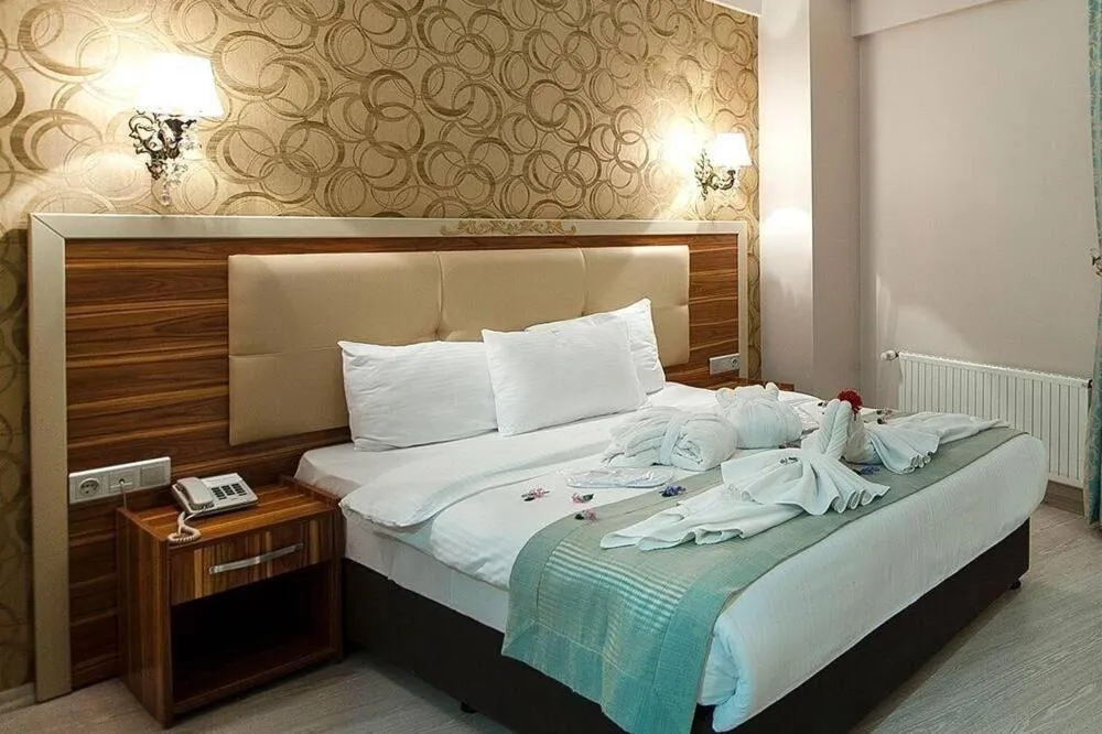 Bed in Almero Termal Spa Otel