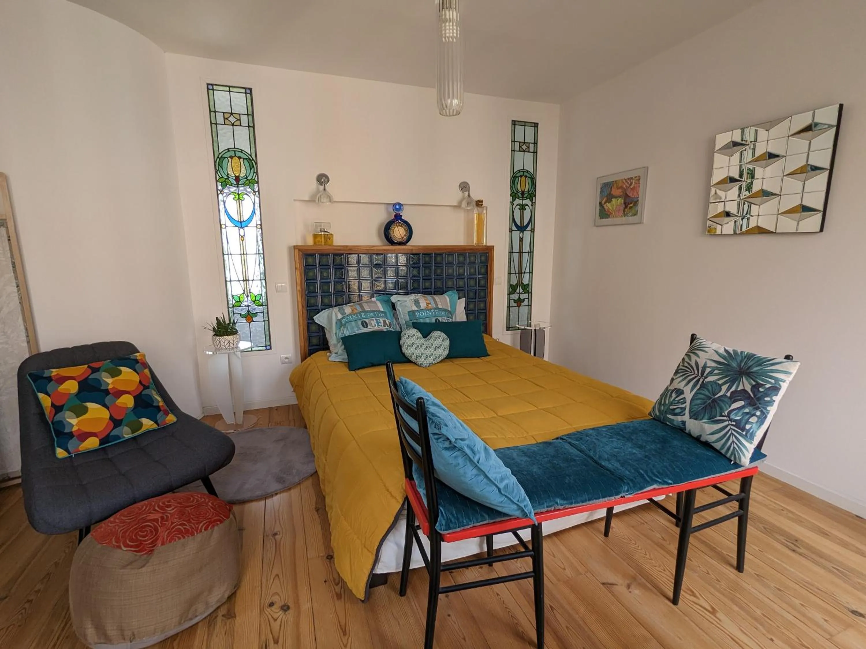 Bedroom in Chambre d'Hôtes La Grenade Bleue