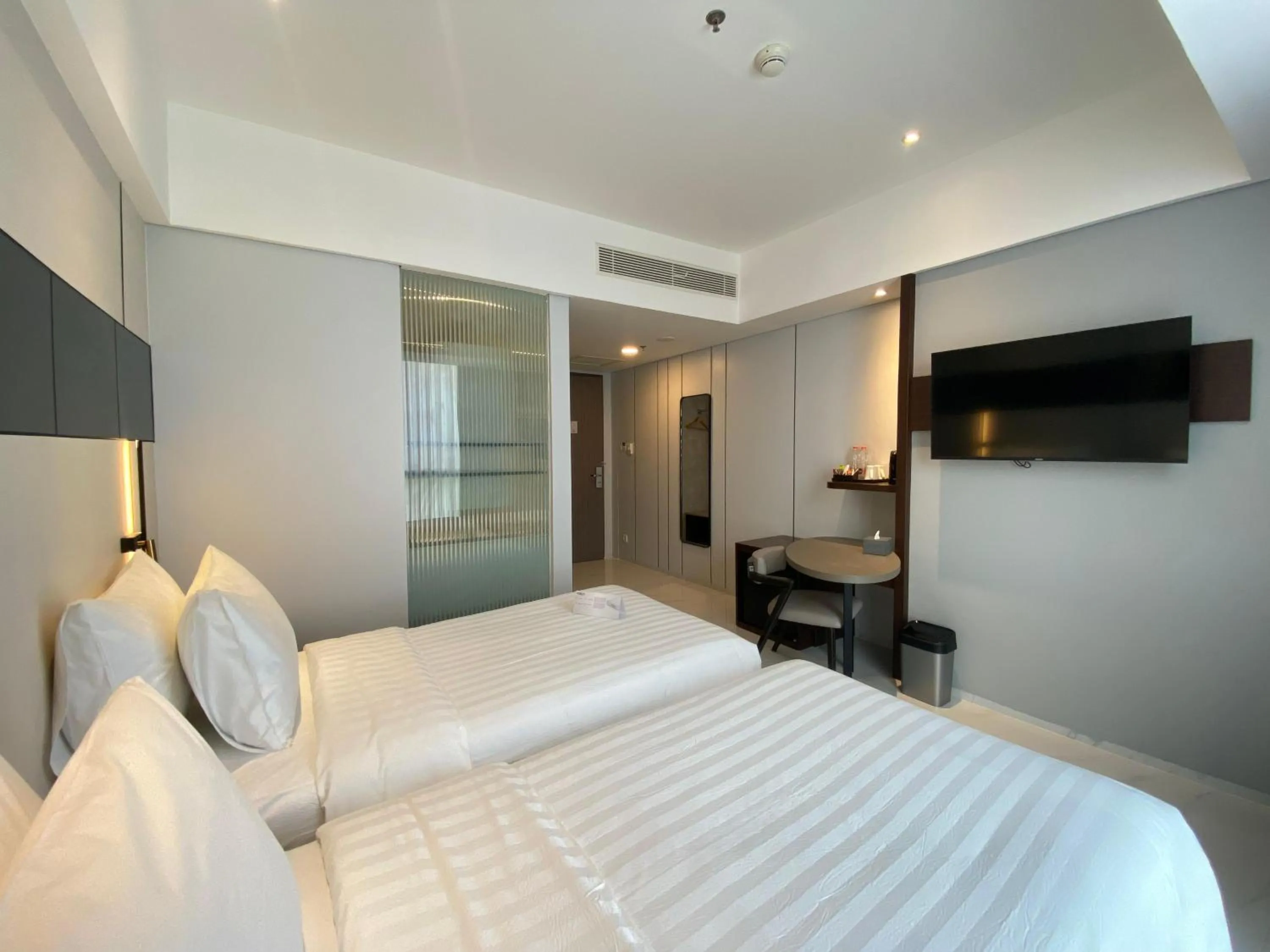 Bedroom, Bed in Grand Whiz Hotel Praxis Surabaya