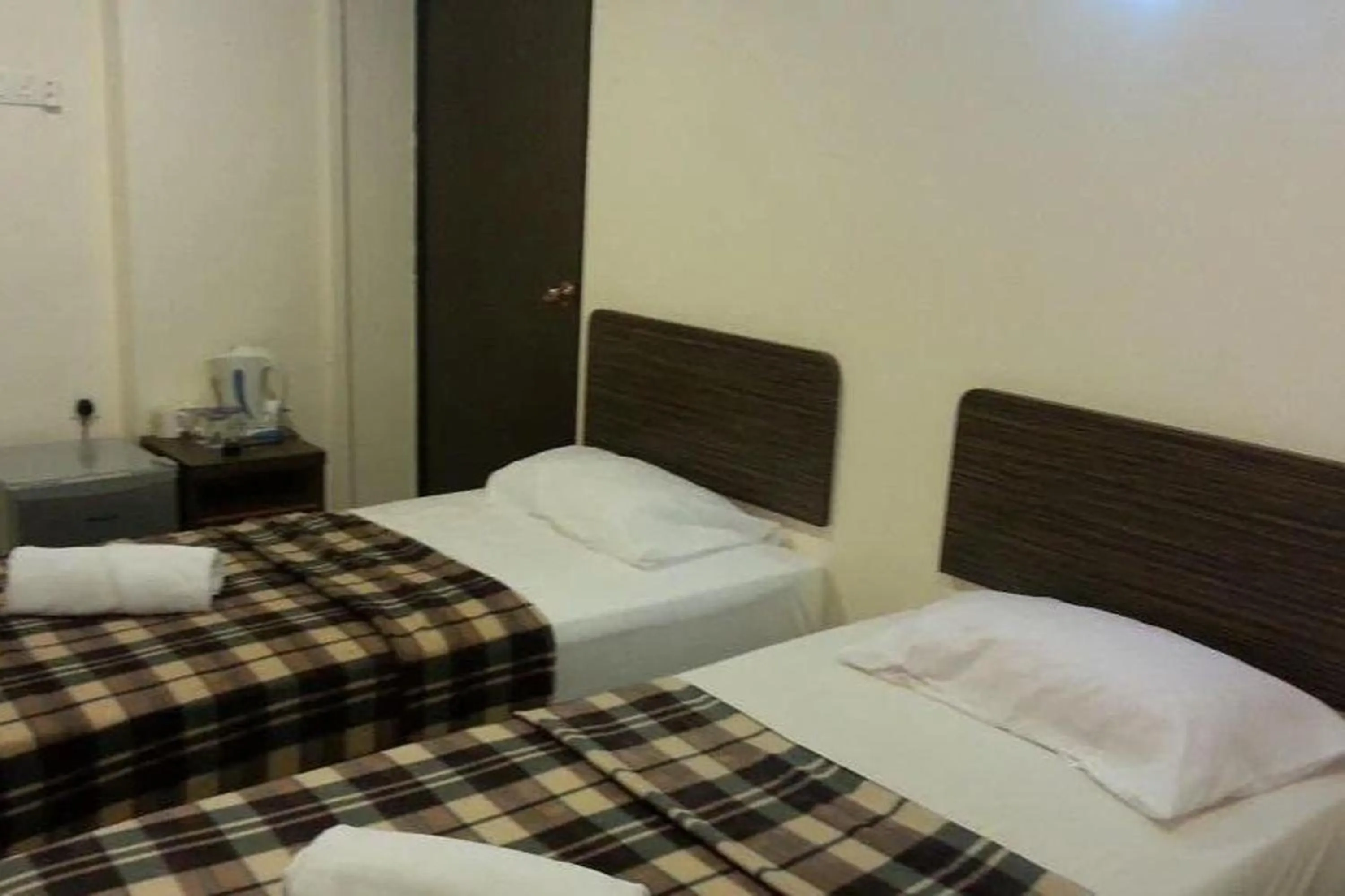 Bed in Hotel D Lima Inn Langkawi