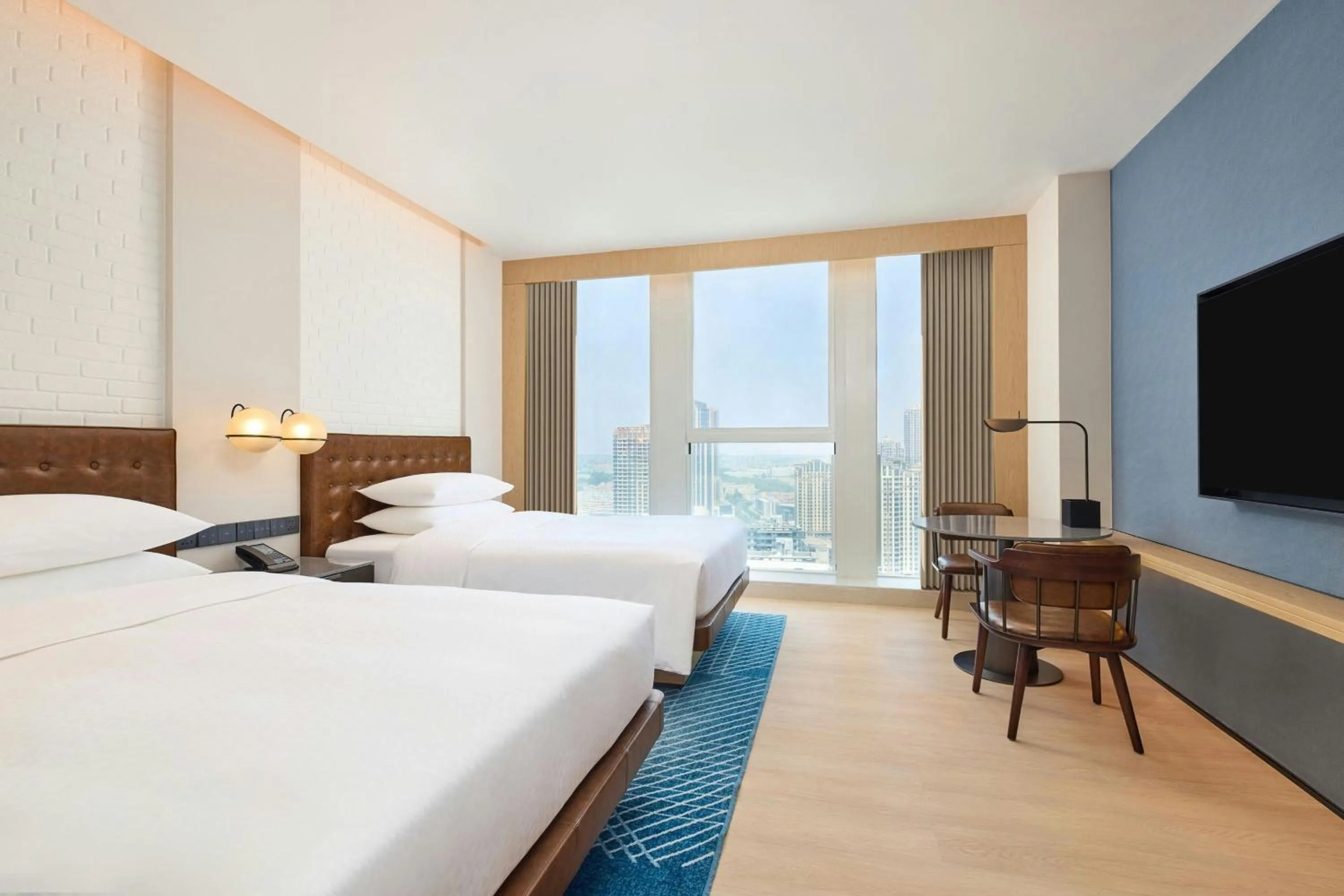 Photo of the whole room, Bed in Four Points by Sheraton Rizhao
