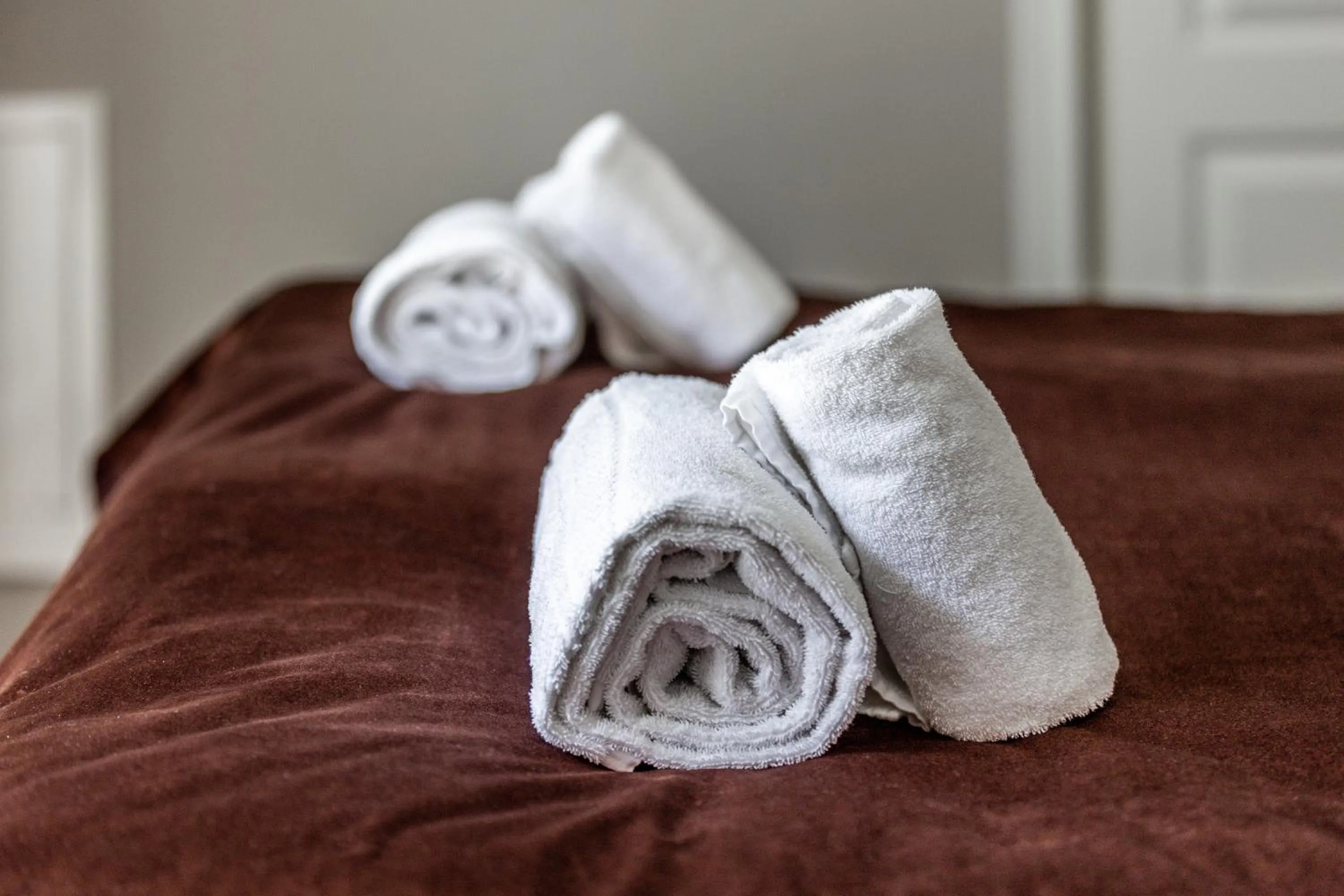 Bed in Cameo Boutique Hotell