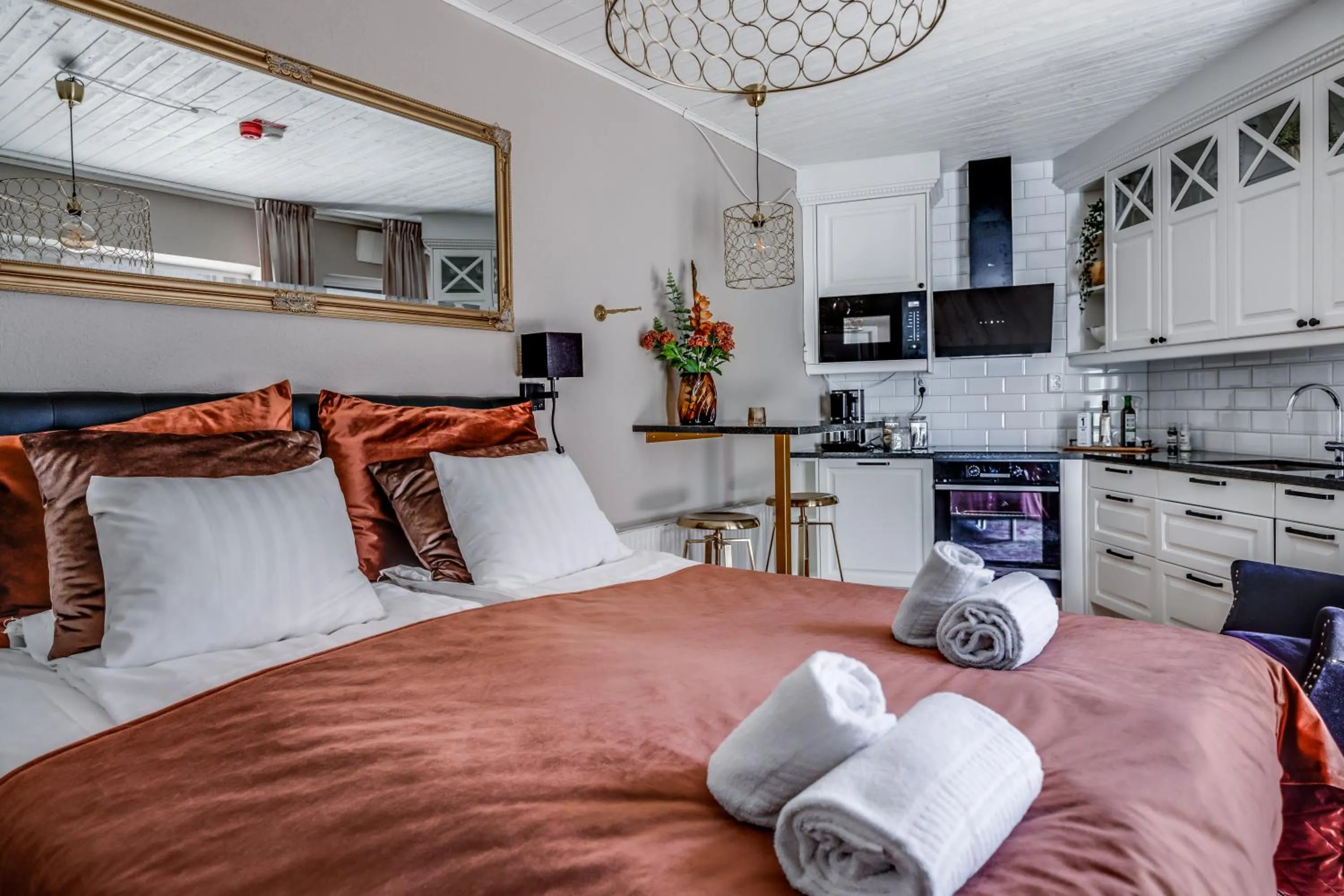 Seating area, Bed in Cameo Boutique Hotell