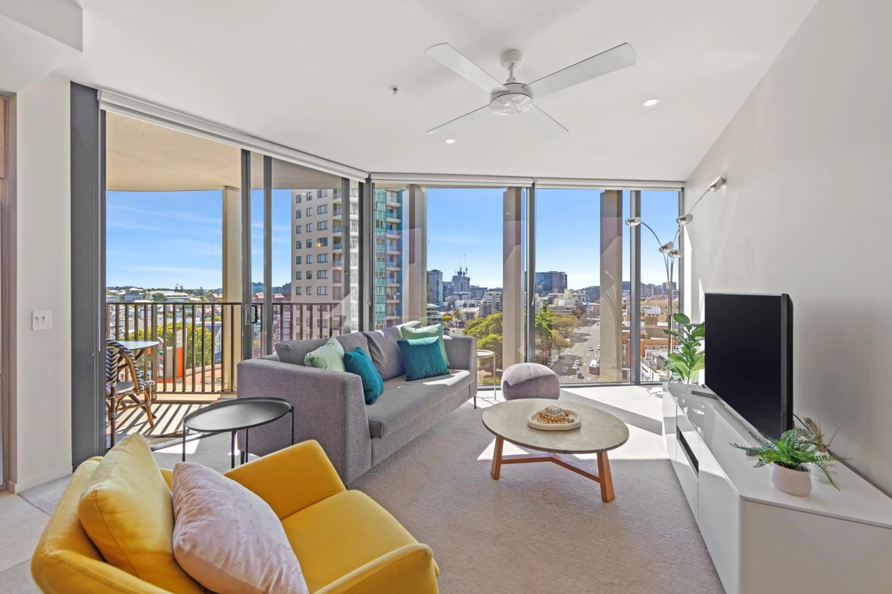 Living room in Spire Residences by CLLIX