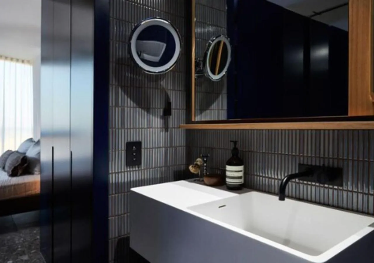 Bathroom in Spire Residences by CLLIX
