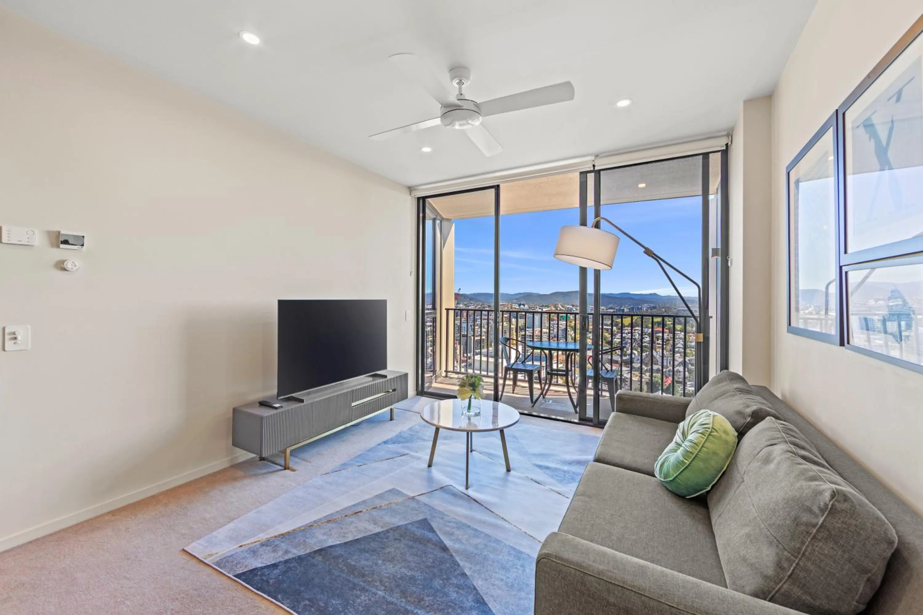 Living room in Spire Residences by CLLIX