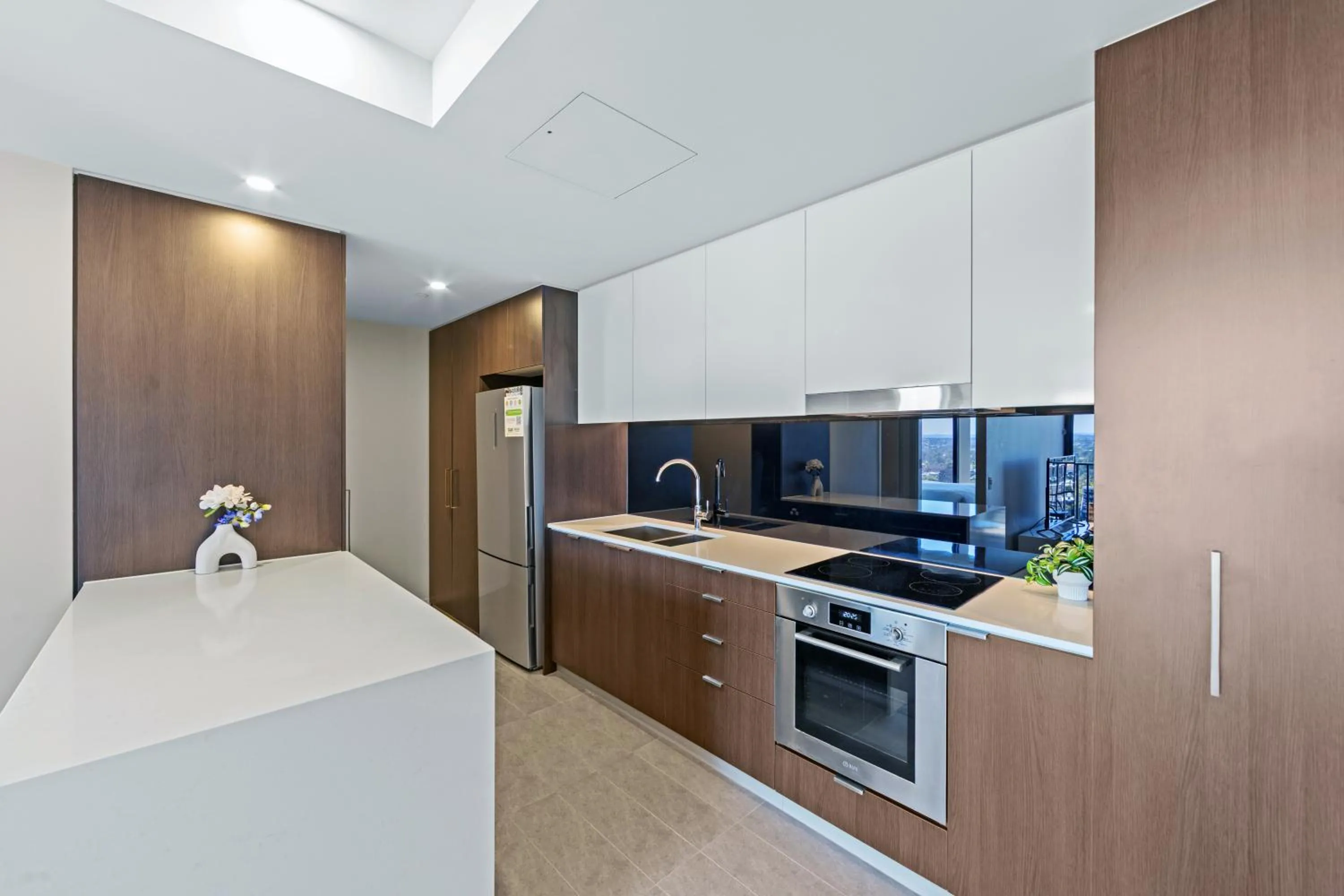 Kitchen or kitchenette in Spire Residences by CLLIX